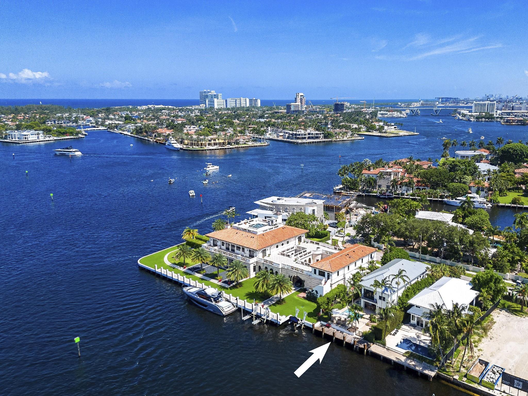 This stunning property presents wide water views where the New River meets the Intracoastal Waterway. Choose to live the ultimate South Florida lifestyle in this meticulously designed and perfectly maintained waterfront home nestled on one of the finest streets in the historic Rio Vista waterfront neighborhood. The home has numerous custom builtins, bookshelves and hardwood floors throughout. The upstairs primary bedroom suite has two baths and a separate sitting room with beautiful views of the New River. Experience outdoor living and entertaining on the covered loggia with outdoor grill. Exterior walls were re-stuccoed and new A/C units added recently, along with new awnings and garage doors, plus impact windows and alarm system. A new metal roof was added in 2023.