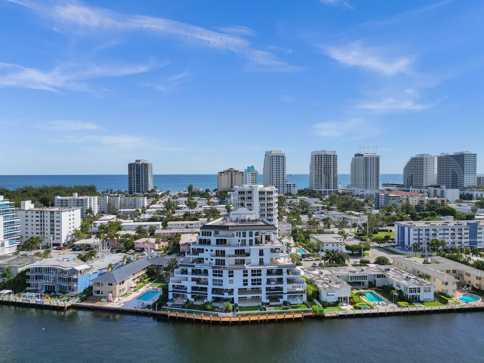 Rarely available 3 BR, 3 BA waterfront condo in highly desirable La Cascade! Large unit w/ open floor plan featuring a 600+SF covered balcony w/ built-in TV & electric fireplace w/ panoramic intracoastal waterway views...perfect for entertaining! Huge kitchen w/ stainless appl, bar area & tons of storage space! Floor-to-ceiling impact glass allows for stunning water & downtown Ft. Lauderdale skyline views! Travertine flooring on the diagonal & automatic shades inside & out! Spacious primary BR w/ balcony access & bathroom w/ dual sink vanity & jacuzzi tub! 2 covered parking spaces! New 2021 A/C, 2 tankless hot water heaters & full-sized front loading W/D in unit! Ring doorbell & cameras! Day dock for your boating needs! Pet friendly & short walk to beaches, restaurants & more! Must see!