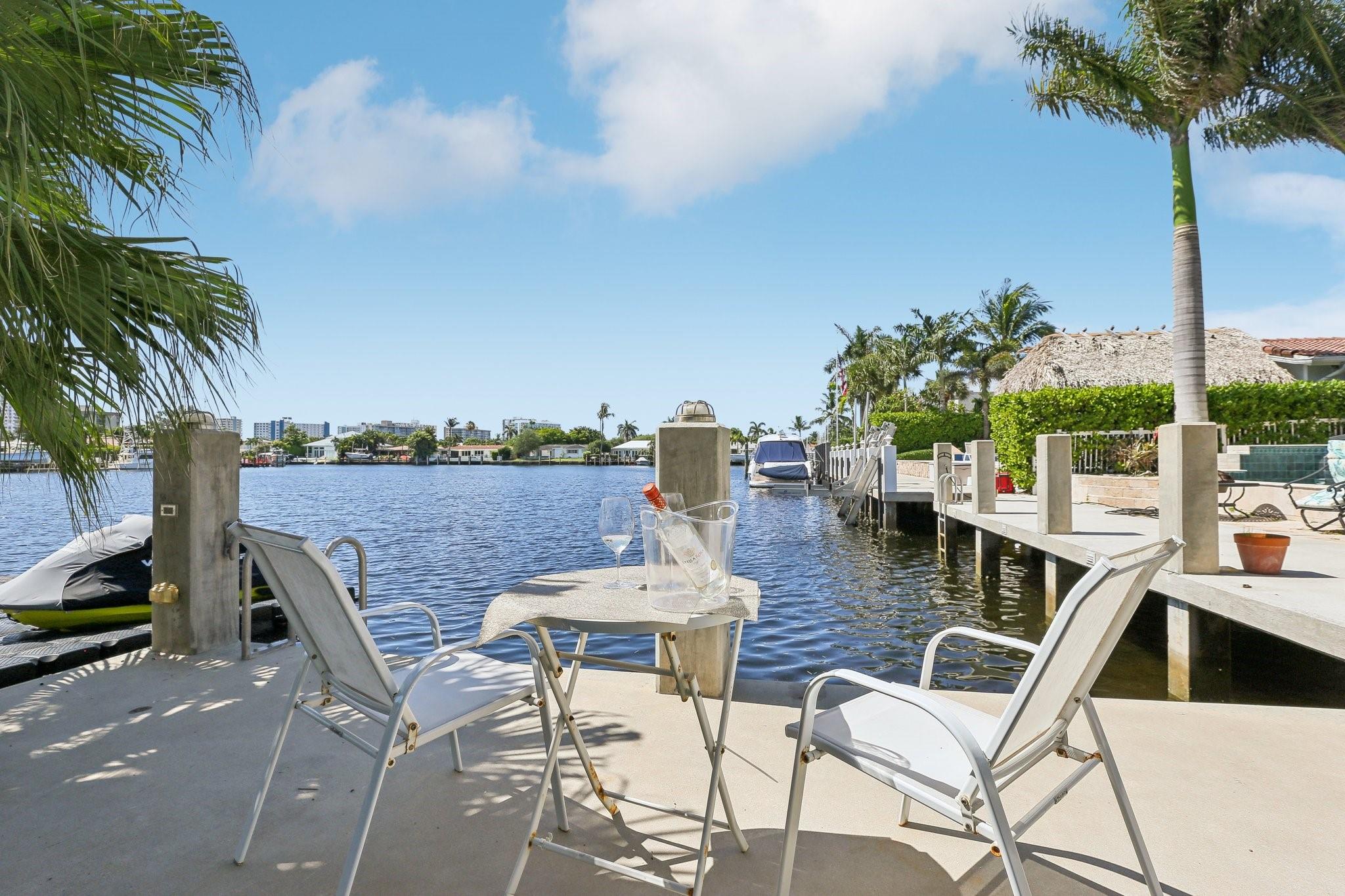 REDUCED PRICE FOR SALE!!!!Beautiful single-story corner house located in HARBOR VILLAGE on Lake Capri includes an exclusive 32' private dock. The home features a welcoming open layout, a spacious master suite with an elegant bathroom, contemporary stainless steel appliances, impact-resistant windows, a recently updated air conditioning system, water heater, and plumbing. Positioned just moments away from Hillsboro Inlet, the home offers convenient access to various dining options on Atlantic Blvd, as well as the Pompano Beach Boardwalk and Pier.