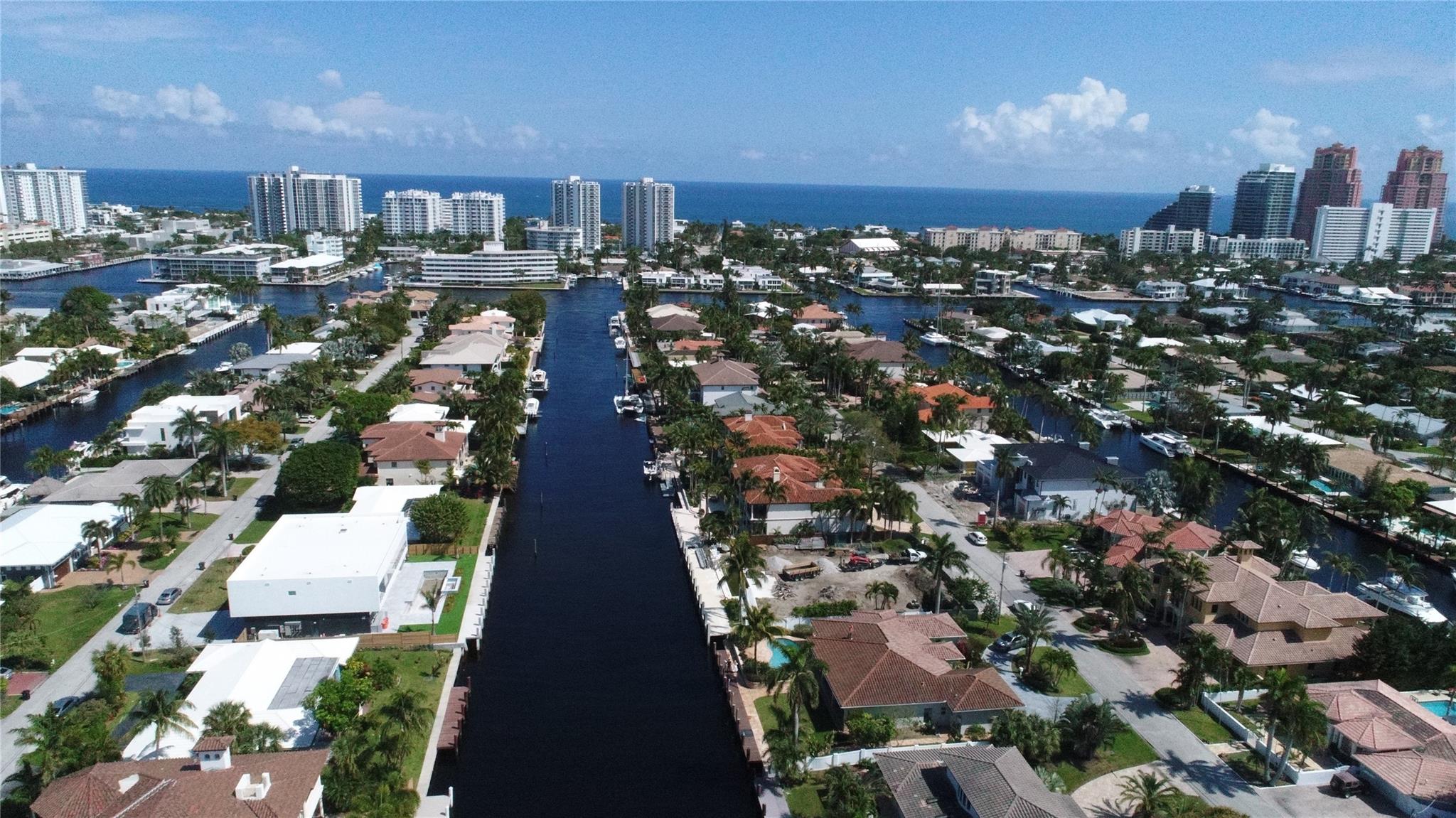 Building you a brand new 100 ft concrete dock with raised sea wall. Soaring ceilings with Impact windows & doors, open living space. 4 panel glass sliders 8 ft tall showcasing tranquil water views. Bayview A+ schools. This 3 brm, 3.5 bath home is on the best block of luxurious Coral Ridge deep water enclave with many new mansions around. This amazing 12,000 sf property has an outdoor bar and grill lounge area by the pool to enjoy Florida lifestyle on water. Large yacht home with easy Intracoastal access. Beautiful simulated wood tile floors throughout with built in electric outlets. Split bedrooms opening to outside oasis, auto shades. Wood built out closets. New picturesque tropical landscaping. 2 car garage, circular driveway, generator. Fast closing and move-in ready.
Don't miss this. Deep water 100' 2019 open concept floor plan home. Natural wood kitchen with large island, and built-in appliances. Prestigious area of Fort Lauderdale Coral Ridge area south of Oakland Park Blvd. New Concrete Dock has approved plans that we are building. Wide canal with views of beautiful architecture homes across.