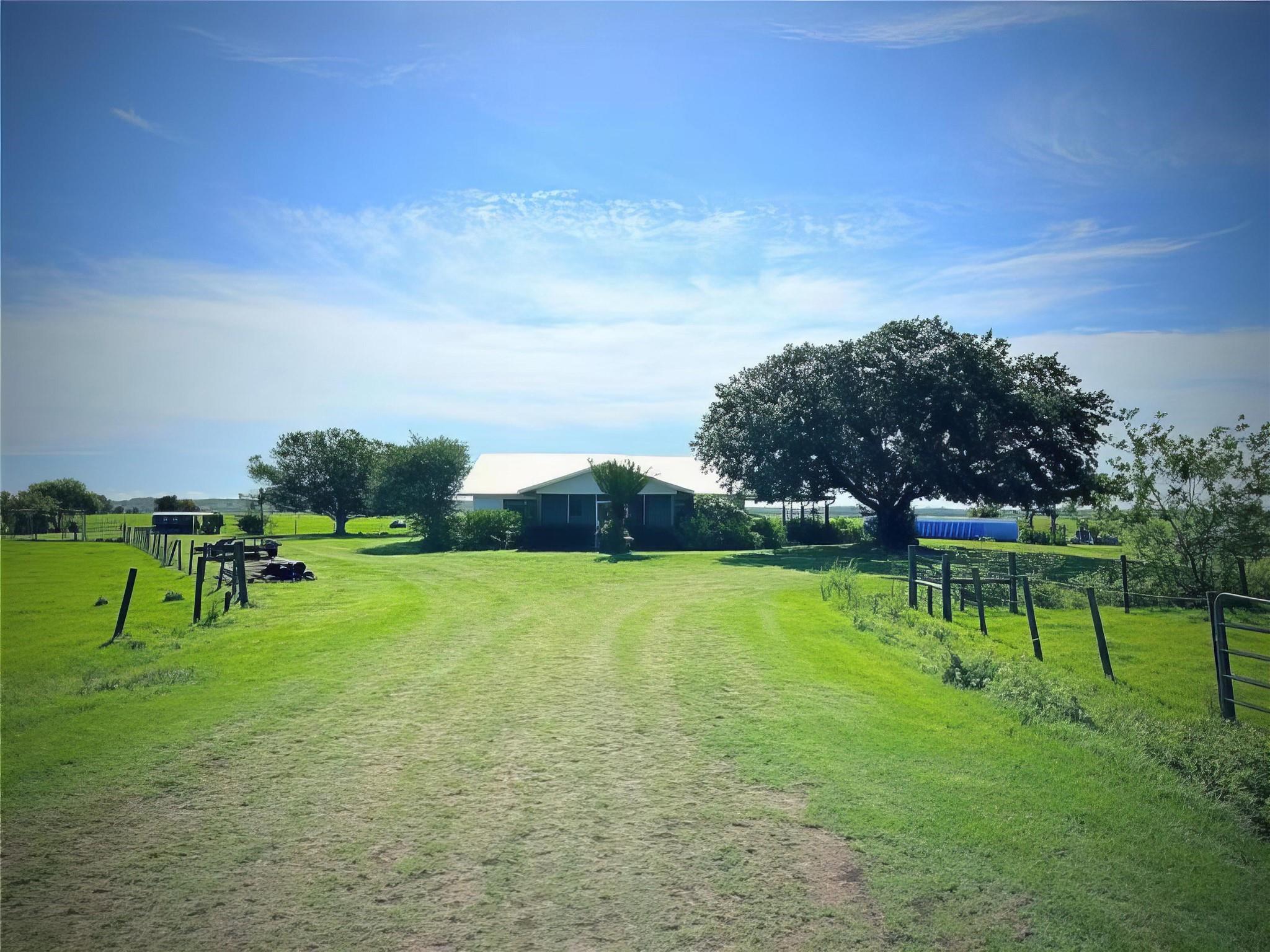 Gorgeous 2 bed, 2 bath home on 20 acres! Includes an above-ground pool, Florida room overlooking the back pasture, barn, and private driveway. Spacious back porch, and kitchen. Newly installed storm windows. Florida room access from the master, and tile throughout.