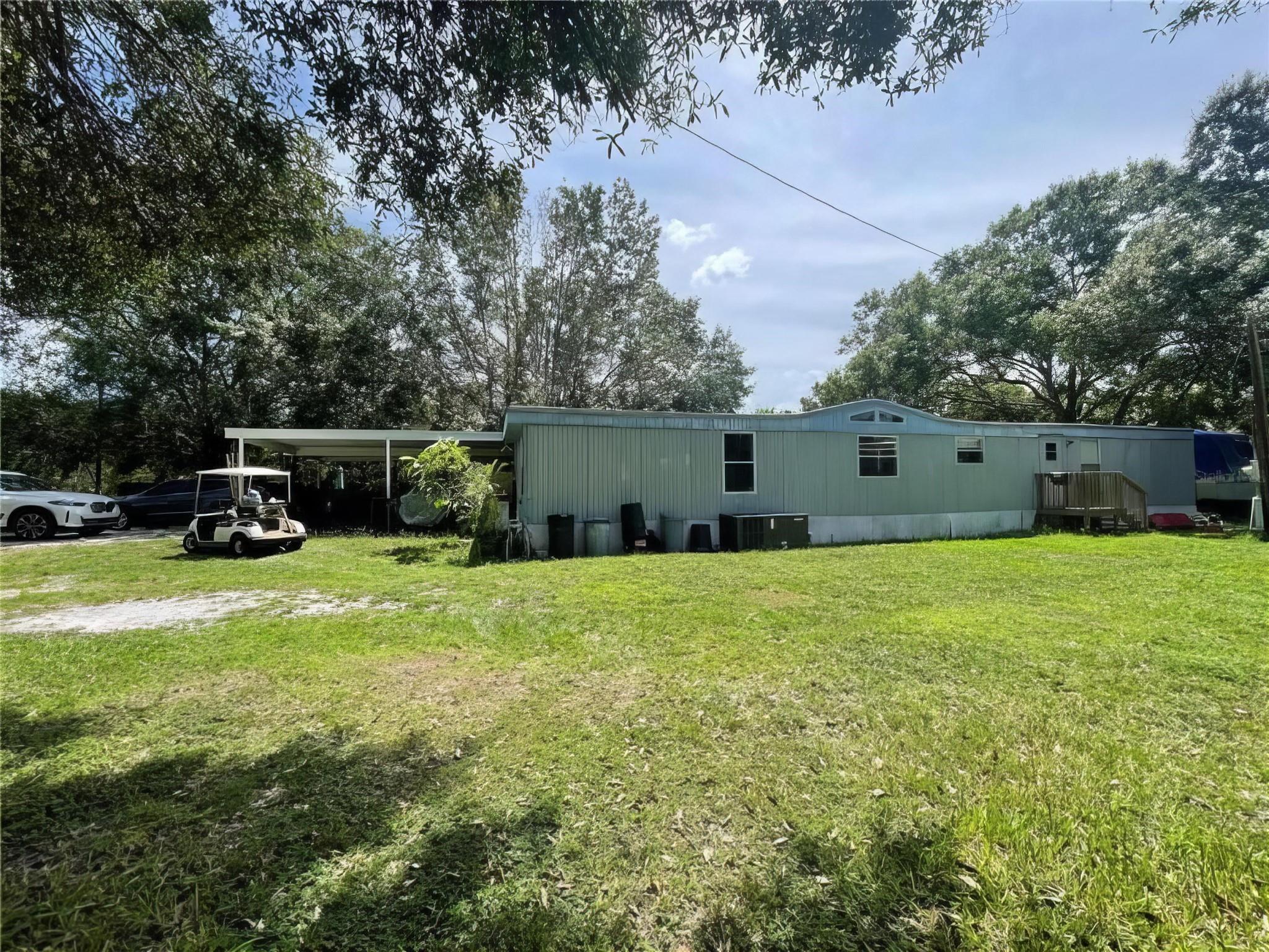 Serene Living- 2/2 mobile home situated on 4.9 +/- acres in close proximity to amenities.  Property is fenced and animals are welcome.   Mobile home has new flooring and new central AC. 1152 sq ft & 1976 TLA. Seller is offering OWNER FINANCING Call for more details!