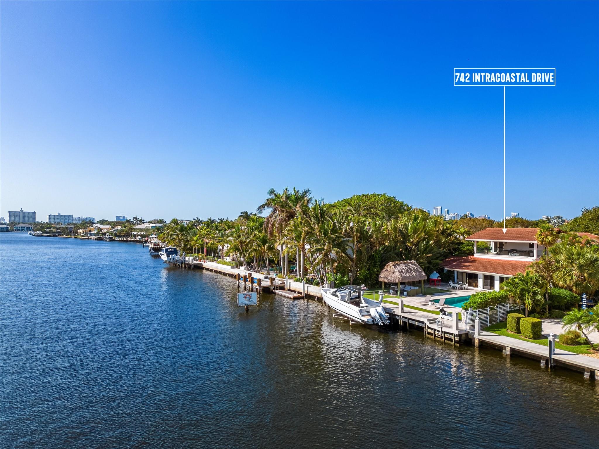 This double lot (19,456 sq ft) boasts 75 ft of direct intracoastal frontage in highly sought after Sunrise Intracoastal.  The 3,931 sq ft of living space includes 5 bedrooms and 3 full baths.  The backyard is ideal for entertaining with a pool, tiki hut, putting green and recently upgraded dock/seawall and 15,000 pound boatlift (2020).  Close proximity to beaches with tons of 4 star restaurants and Bayview school district.