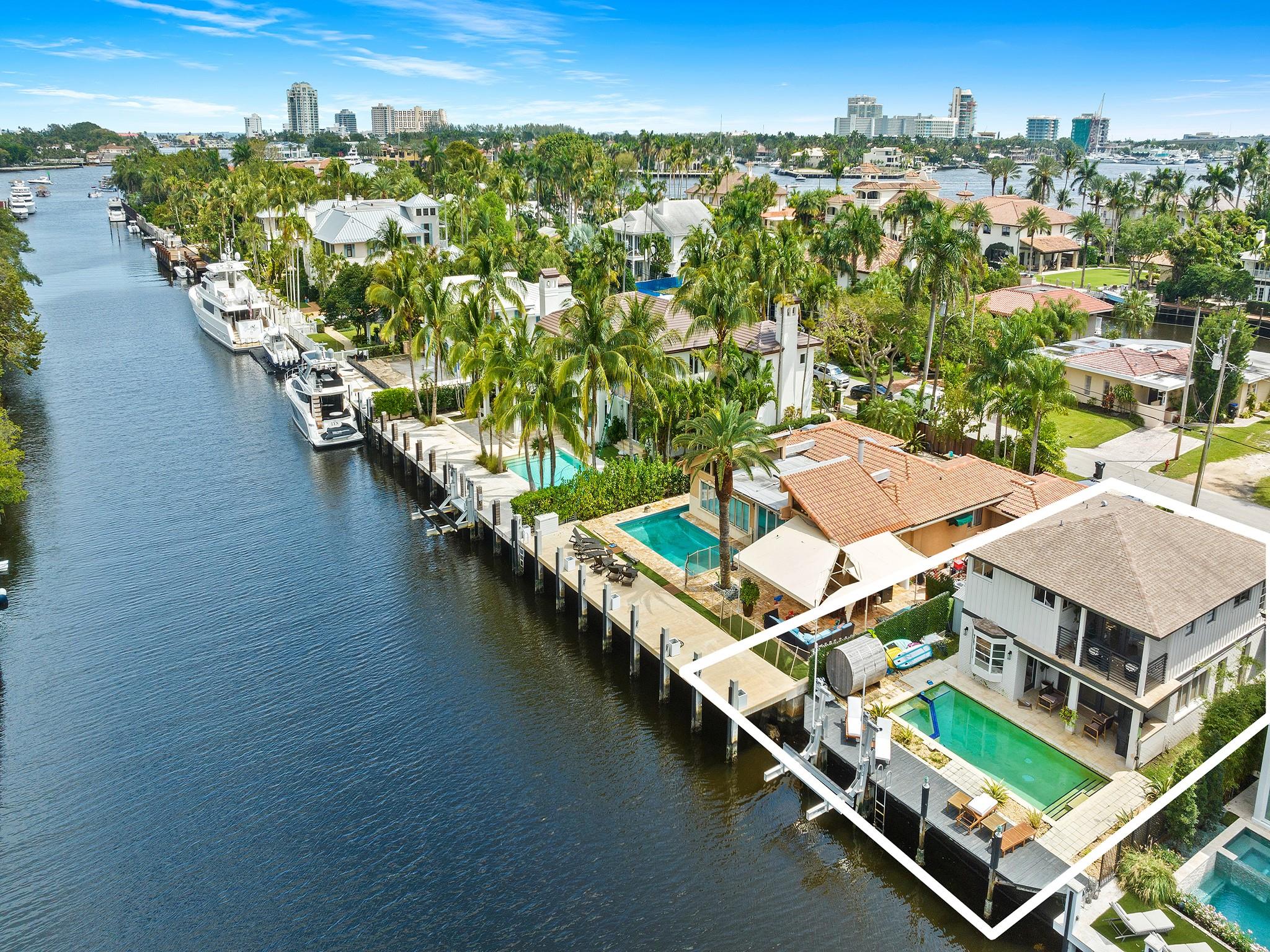 Located at one of the finest isles of Rio Vista with the quickest ocean access. NO FIXED BRIDGES. Surrounded by multimillion dollar residences. This location is yacht owner's paradise. Impeccably maintained residence sits on a 50FT WATER-FRONTAGE and has stunning water views from every corner. Some of the features include: BOAT LIFT, office room, covered patio with BBQ, brand new deck, fire place, laundry room, driveway, private waterfront terrace, den, HIS AND HER CLOSETS, newer roof, new appliances, brand new AC units, new floors, custom sound system throughout, security cameras at the exterior, grass area for kids & pets and many more! Completely renovated in 2022. Best school district. Great luxury rental potential. Furniture negotiable. No HOA or restrictions.