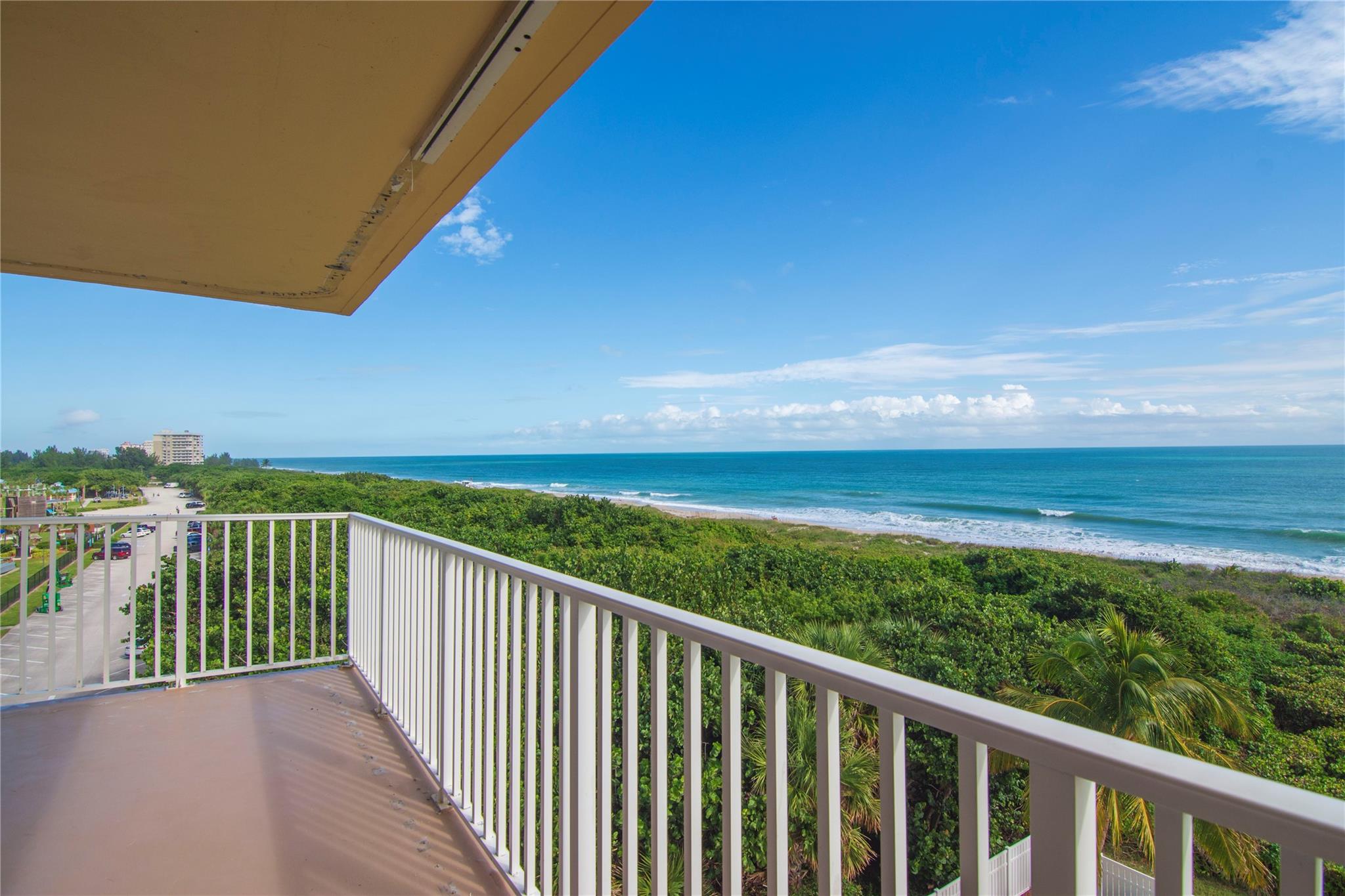 Oustanding condo in sought-after Sea Palms. The views are spectacular! Look north up the beach for miles past the Navy Seal Museum, enjoy unobstructed ocean views offering incredible sunrises, & see d'town Ft Pierce & the intracoastal from your front door. Listen to the waves while having coffee on your wrap-around balcony or while enjoying a good book from your sofa. This home has been tastefully updated & being sold turn-key. Updates include tile thru-out, granite counters, new lighting, & newer A/C & hot water heater (2021). Pipes, balcony, & new hurricane shutters all re-done in this home. Walk out the building to private access to unspoiled beaches. Amenities include pool, club room, pickleball/tennis, & shuffle board. Residents love this community. Outstanding North Beach location!