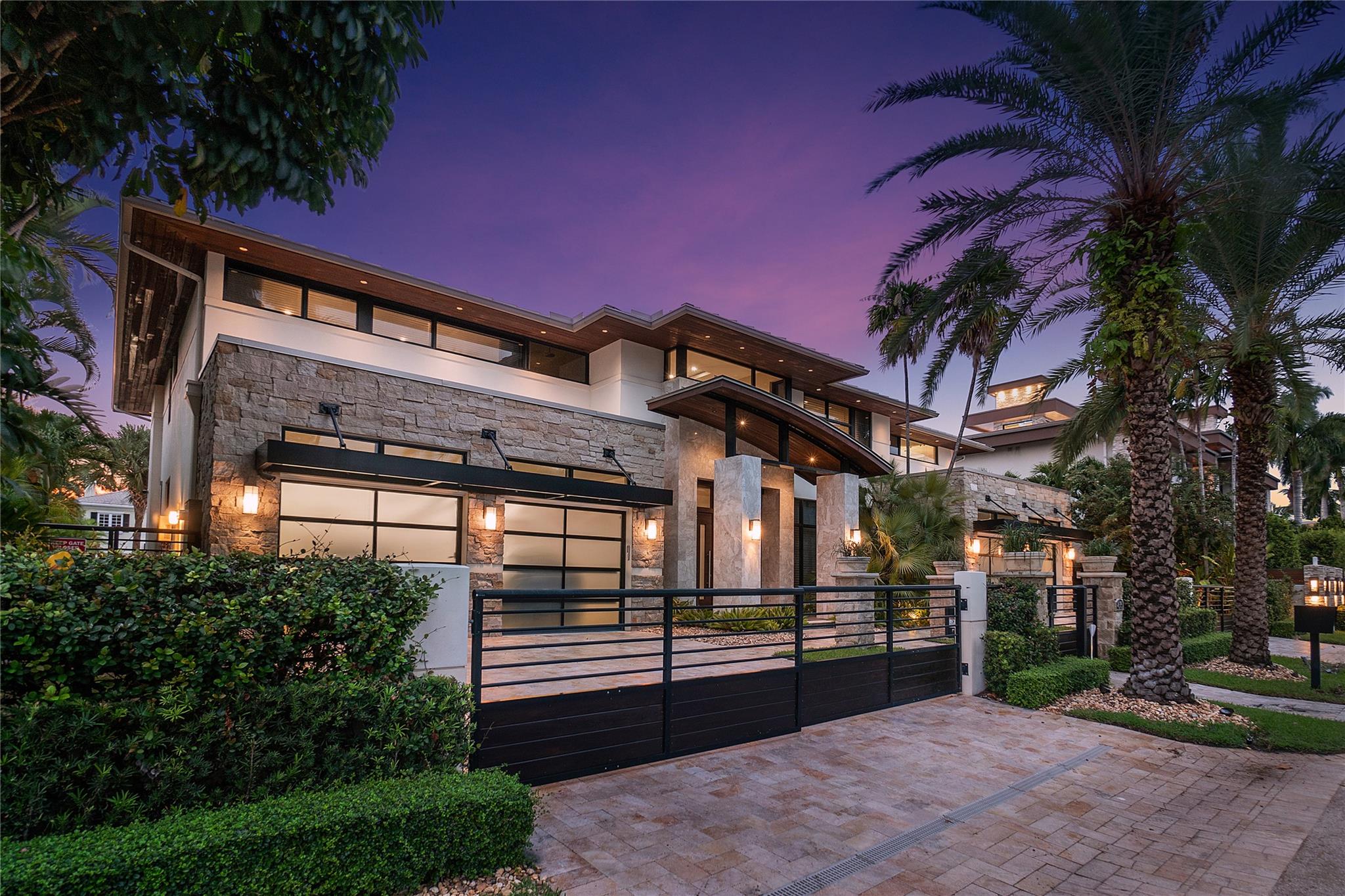 A Blend of Art & Modern Architecture Define this Sophisticated Contemporary Masterpiece. Water, Fire,Stone,Wood,Glass & Metal Elements Blend Together Creating An Unparalleled Standard Living. Highly Sought After South Side of Las Olas Isles on 100ft of Premium Deep Draft Waterfront. Quick Ocean Access w/ No Fixed Bridges. Generous Floor Plan w/ Living & Dining Space Perfect for Indoor & Outdoor Entrainment. Fireplace, Bar & Glass Enclosed Wine Cellar. Resort Style Pool, Office, Generous Sized Bedrooms, In-Law Suite, Huge primary Baths & Closet. Control 4 Home Automation System, 16 Cameras, 4 Car Garage w/ 2 electric charges, Automated Mosquito Control Sysytem,Gated & Secured. Minutes to Fort Lauderdale Airport, World Famous Fort Lauderdale Beach and Las Olas Isles Shopping and Restaurants.