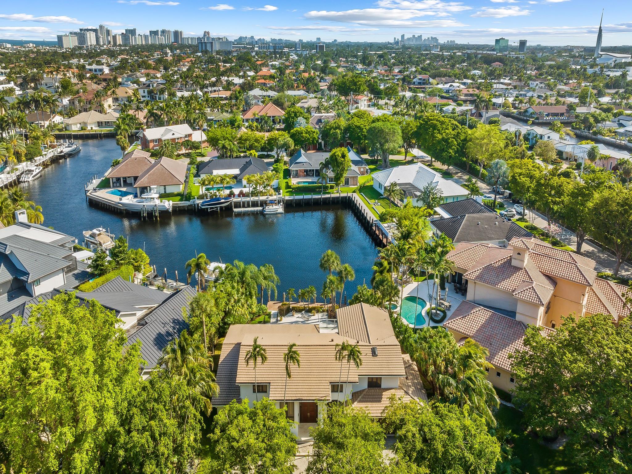 Welcome to 10 Bay Colony Drive, a stunning waterfront residence in the prestigious Bay Colony community. This spacious 5-bedroom, 5.5-bathroom home boasts +/- 80ft WF with a +/- wide 50ft dock, offering picturesque views and serene living.

It features 2 master suites, 1 on each floor. Both master-bath’s have separate showers and tub. Each of the remaining 3 bedrooms also has its own en-suite bathroom, providing comfort and convenience. The elegant kitchen has Bosch and SubZero appliances with marble countertops perfect for creating culinary masterpieces. The 3-car garage has a/c and epoxy floors with ample space.

Located in sought-after Bay Colony, this home is also close to excellent schools, airports, and the beach, offering residents a convenient and luxurious lifestyle.