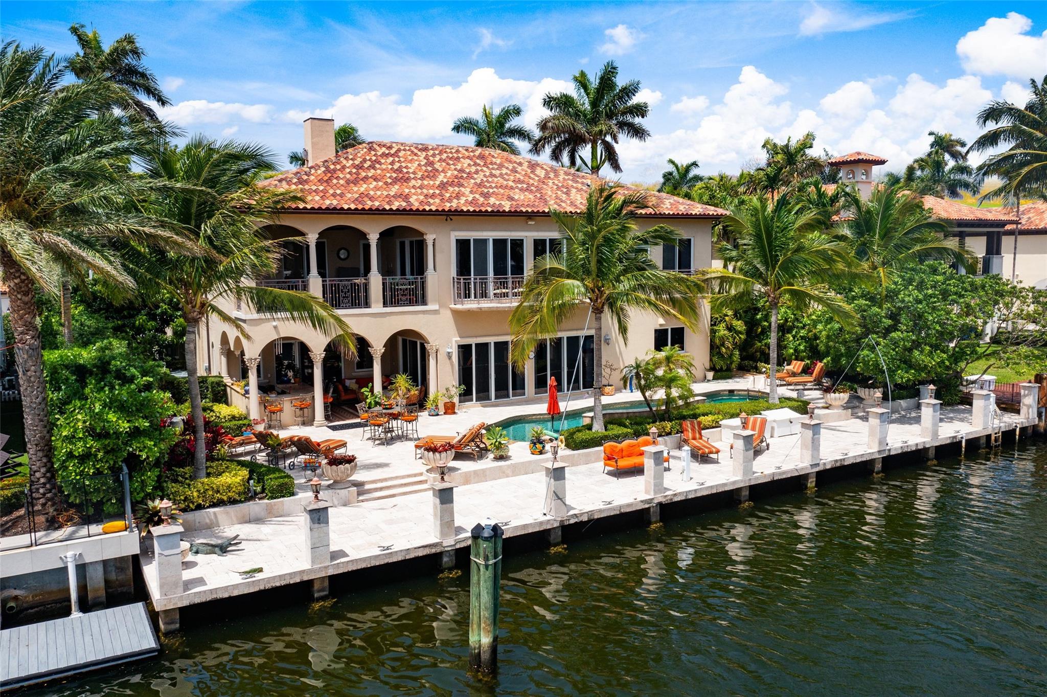 DESIRED SOUTH LAS OLAS WITH WIDE PANORAMAS OF SUNSET LAKE | NAT GAS GENERATOR | ELEVATOR | SAVANT LIGHT AUTOMATION | 2 CAR GARAGE | CONCRETE CONSTRUCTION | CONCRETE DOCK & 100 AMP SERVICE. GREAT RM: WRAP-AROUND BALCONY | BULLNOSE MARBLE & WROUGHT IRON STAIRCASE | ART NICHES | STONE FIREPLACE | LIGHTED TRAY CEILINGS | MARBLE FLOORS | CRYSTAL CHANDELIER | STAINED GLASS. MEDIA PARLOR: ONXY TOPS & WET BAR & ICEMAKER & MAHOGANY PANELING. LANAI: WET BAR SUMMER KITCHEN & DINING AREA & MOUNTED MEDIA. KITCHEN: NEFF KITCHEN & BURL WOOD CABINETRY, VIKING STOVE & RANGE. BUTLER PANTRY: 4TH DISHWASHER & 2ND FRIDGE & FREEZER & ICEMAKER. PRIMARY BR: COVERED TERRACE WITH SEATING & MOUNTED TV, WET BAR, STEAM SHOWER, ETCHED GLASS, ISLAND CLOSET & DRESSING RM. 15-MINUTES VIA BOAT TO INLET. 5 MINUTES TO BEACH