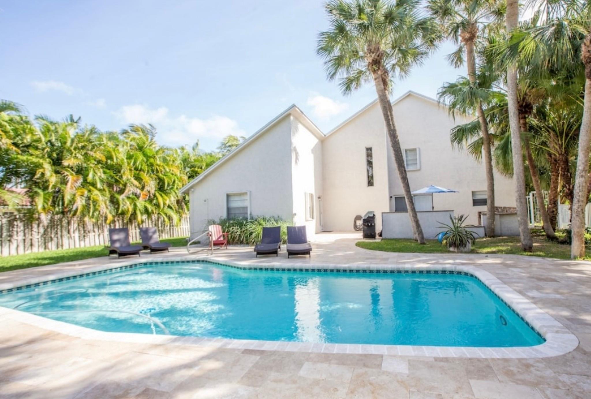 Beautiful 4-Bedroom 3- Bath house, plus office room located across the street from the beach, on over size lot with heated pool. Updated Kitchen, bathrooms, and marble floors. The house has 2 AC systems. The master-bedroom has views of the Ocean.
