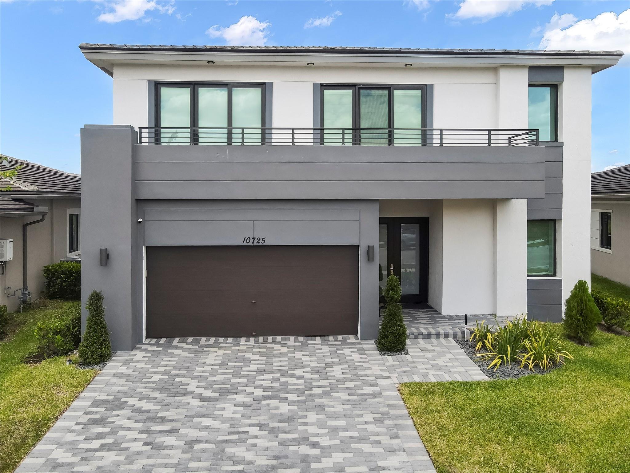 Welcome to this newly constructed (2019), beautifully upgraded 5 bed + loft, 4 bath, 4000+ sqft home featuring luxurious finishes & modern amenities. Energy efficient, smart home includes: impact glass windows & doors, "Shangri-La" terrace w/motorized shades, sleek white modern kitchen w/ gas stove, balconies, garage system w/epoxy floor, porcelain floors, luxury hard flooring, enormous primary bedroom w/ seating area, designer finishes, custom built in closets, oversized rear yard, fenced yard w/ "Toad Buster" pest security, 1st flr guest bedroom. Experience comfort & sophistication in this meticulously designed oasis. The 2 clubhouses include a resort-style pool ambiance, expansive pool & party rooms, tennis courts, indoor basketball courts, gym, & lap pools. 24 hr guard gated community!