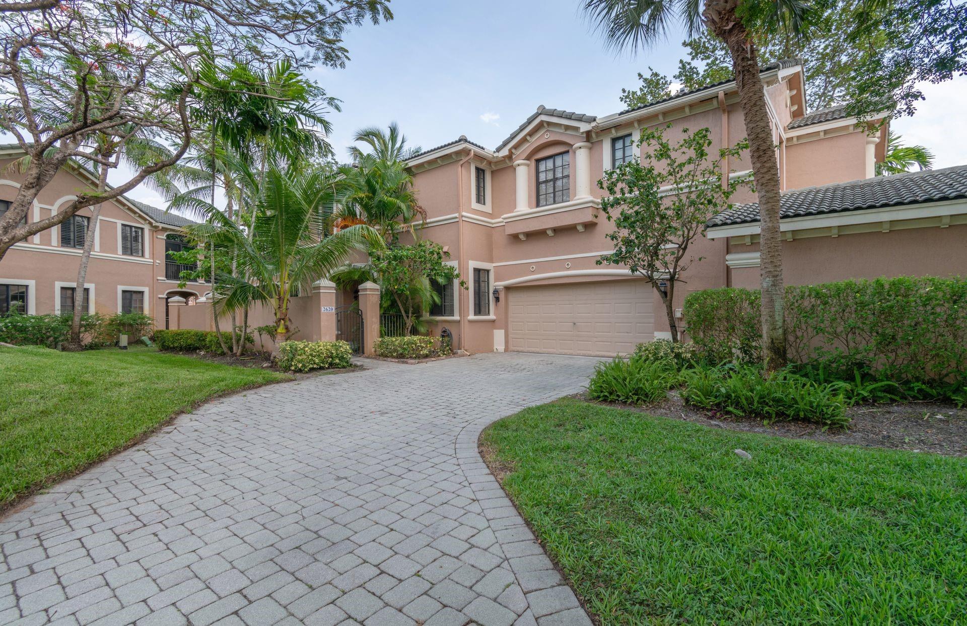Beautiful condo in exclusive Weston Hills. 2 Bedrooms + Den with two full baths and 2 car garage. Tile floors in all living areas and laminate wood floors in bedrooms, covered patio!! Great location across from Weston Hills Country Club!*** A must-see!!!***
