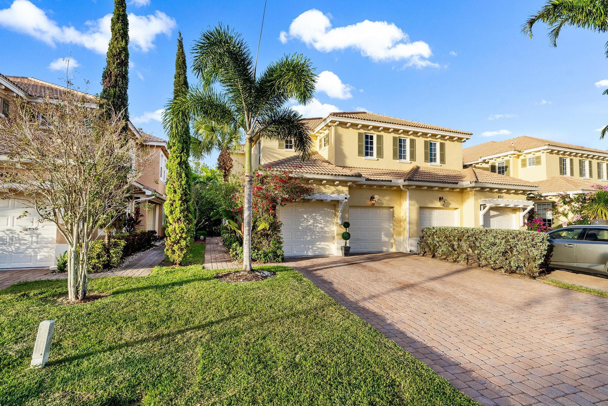 Welcome to 4715 Cadiz Circle, located in Palm Beach Gardens.  This impressive townhome boasts 3-bedrooms (plus 1 den), 2.5-bathrooms and a two-car garage, nestled in the prestigious gated community of Paloma. This property offers an exceptional blend of comfort, convenience, and style.Opportunity abounds as you step into this sizable townhouse!  The floor plan creates a continuous flow from room to room, making it perfect for entertaining, everyday living or working from home with a large loft area and space for a home office. The kitchen features updated appliances, a large island and granite countertops. Whether you're hosting a dinner party or enjoying a quiet night in, the kitchen will be the heart of your home. One of the standout features of this property is the screened-in patio, where you can enjoy the Florida sunshine in comfort and style. The artificial turf in the backyard provides a low-maintenance, lush green space for relaxation or play. 

Living in Paloma means you have access to the beautiful community pool, ideal for refreshing swims and hanging out with friends and family at the clubhouse. Conveniently located, this community is just a 10-minute drive away from local beaches, the Gardens Mall (feauturing world class shopping), as well as Roger Dean Stadium where you can catch all your spring training baseball games. Also, if you're a frequent traveler, Palm Beach International Airport is only 20 minutes away.

Priced to Sell - don't miss the opportunity to make this wonderful townhouse your new home or investment opportunity!