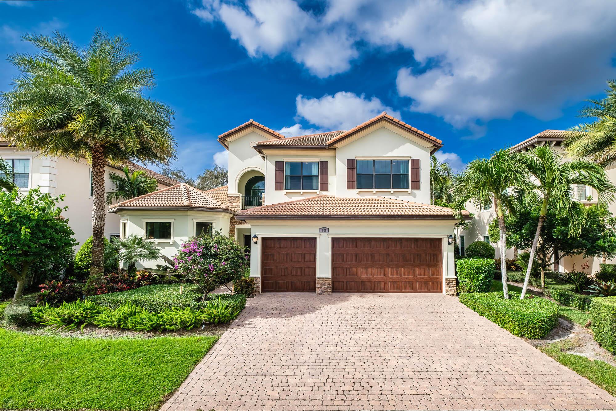 Welcome to Your Oasis of Luxury!  Experience the pinnacle of refined living at Gardenia Isle, Palm Beach Gardens. This two-story 5-bedroom 4 baths and 2 half baths, dream estate seamlessly blends luxury and comfort, creating a residence that exceeds all expectations.  Enter the grand living room with soaring two-story ceilings and an elegantly designed staircase leading to the second floor. The open-concept design effortlessly connects the living, dining, and kitchen areas, providing an inviting space for both intimate gatherings and extravagant celebrations.  The gourmet kitchen, the heart of this home, is a culinary enthusiast's delight. With premium appliances, custom cabinetry, and a spacious island, it sets the stage for creating gourmet meals. The adjoining