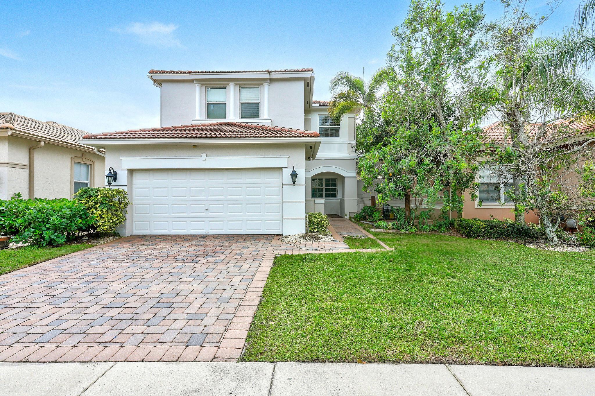 Beautifully updated 4 bedroom / 2.5 bath home located in the desirable gated community of Mirabella in Mirasol. A fully updated kitchen with expanded quartz countertops and newer appliances allow for a greater sense of space, while the large windows across the room provides a scenic lake view.  Many updates done by the current owners include impact glass, custom staircase banister, and much, much more.
