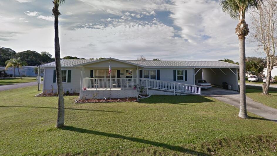 This wonderful 3 Bed 2 Bath 1,860 sf home is a frame on modular. The home is located on a .279-acre lot near I-95 access, dining, shopping, beaches, and the great schools that Martin County is known for. This home features a newly remodeled kitchen with high ceilings, 2 exterior storage rooms, a double carport, community pool, clubhouse, and pet friendly neighborhood. With a Low HOA fee. The home has a metal roof and storm shutters with room to expand on the lot. If your not familiar with a frame on modular home these houses cost approximately 25% more to manufacture than a mobile home. (A different build standard and quality that a HUD rated mobile home) The home is tied in with the deed of the property just as a standard single family home.