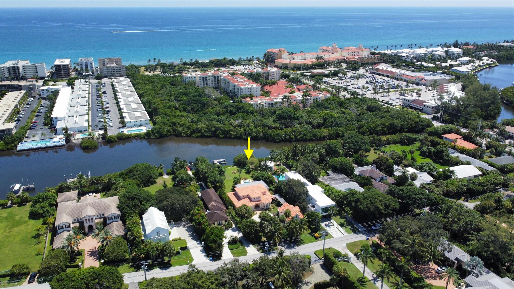 Enjoy peace, privacy, and the ocean breeze from this sprawling 5 bedroom waterfront estate. Oversized 31,000+ lot directly across from nature preserve. With beautiful views of the sunrise, nature, and wildlife, enjoy 100 feet of waterfrontage with private dock and ocean access. Designed by Roger Janssen and custom built with stem wall foundation and CBS construction, additional features include an air conditioned 3 car garage with large finished attic studio, detached guest house with full bathroom, library, high ceilings, impact glass, swimming pool and abundant green space with several varieties of exotic fruit trees. Do not miss this rare opportunity to own one of the best lots and locations in Hypoluxo Island very close to the beach, Eau Palm Beach, Palm Beach, I-95 and PBI airport.