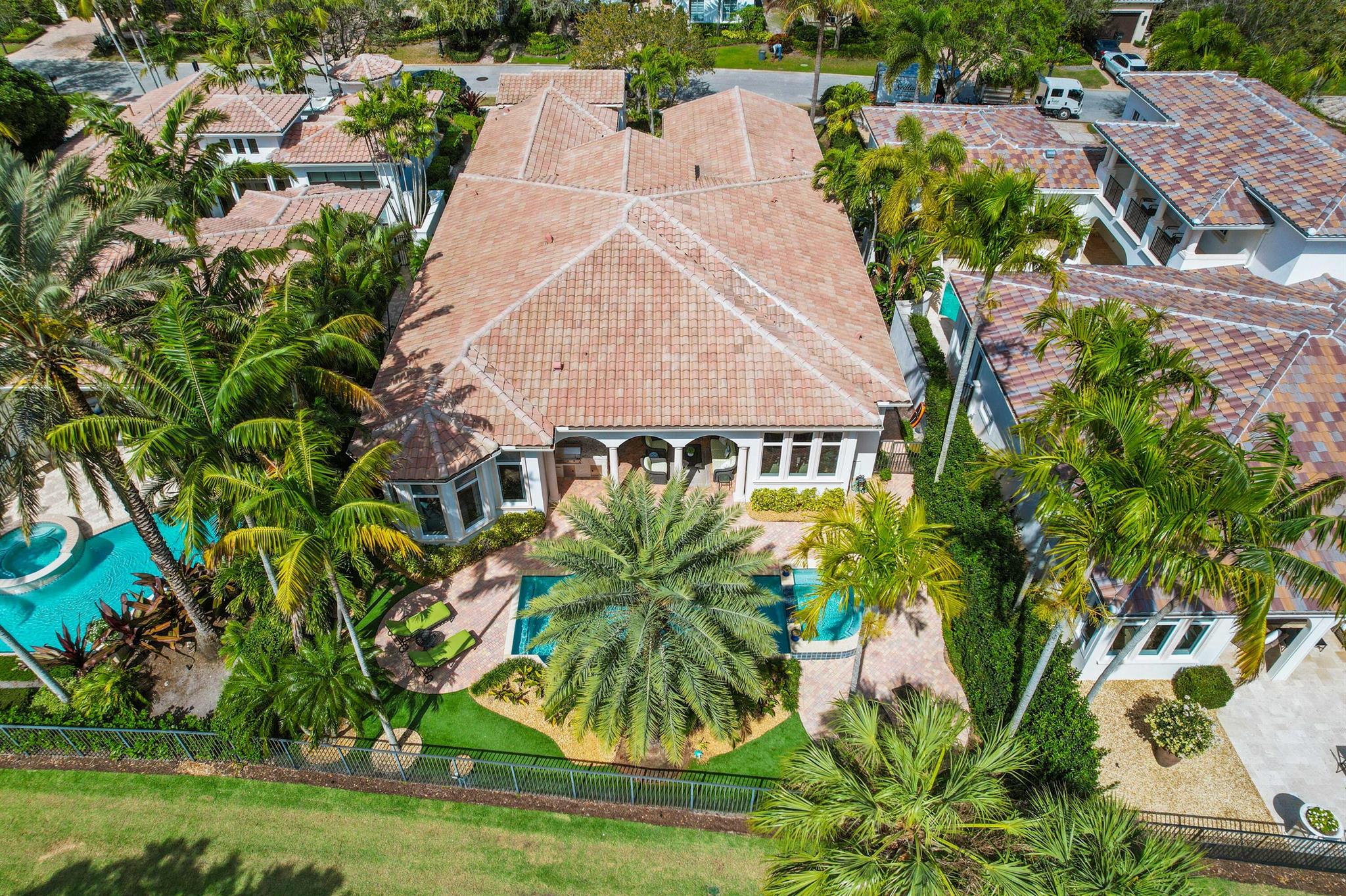 Welcome to this lovely and elegant home siituated in Old Palm Golf Club. This 4 bedroom, 4.1 bath residence is situated on a Golf Estates water feature with south exposure.The Serena model is a very comfortable floor plan, allowing for entertaining and a casual lifestyle with easy indoor/outdoor living. The amazing neighborhood of Old Palm Golf Club has evolved into one of the most premier club communities in South Florida. With a newly renovated clubhouse, and newly constructed 20,000 square-foot lifestyle center, the amenities of the Club community are some of the newest and best around. In addition, Old Palm boasts a 33 acre state of the art practice facility and a beautiful 18 hole Raymond Floyd design golf course with no tee times. This community has it all.