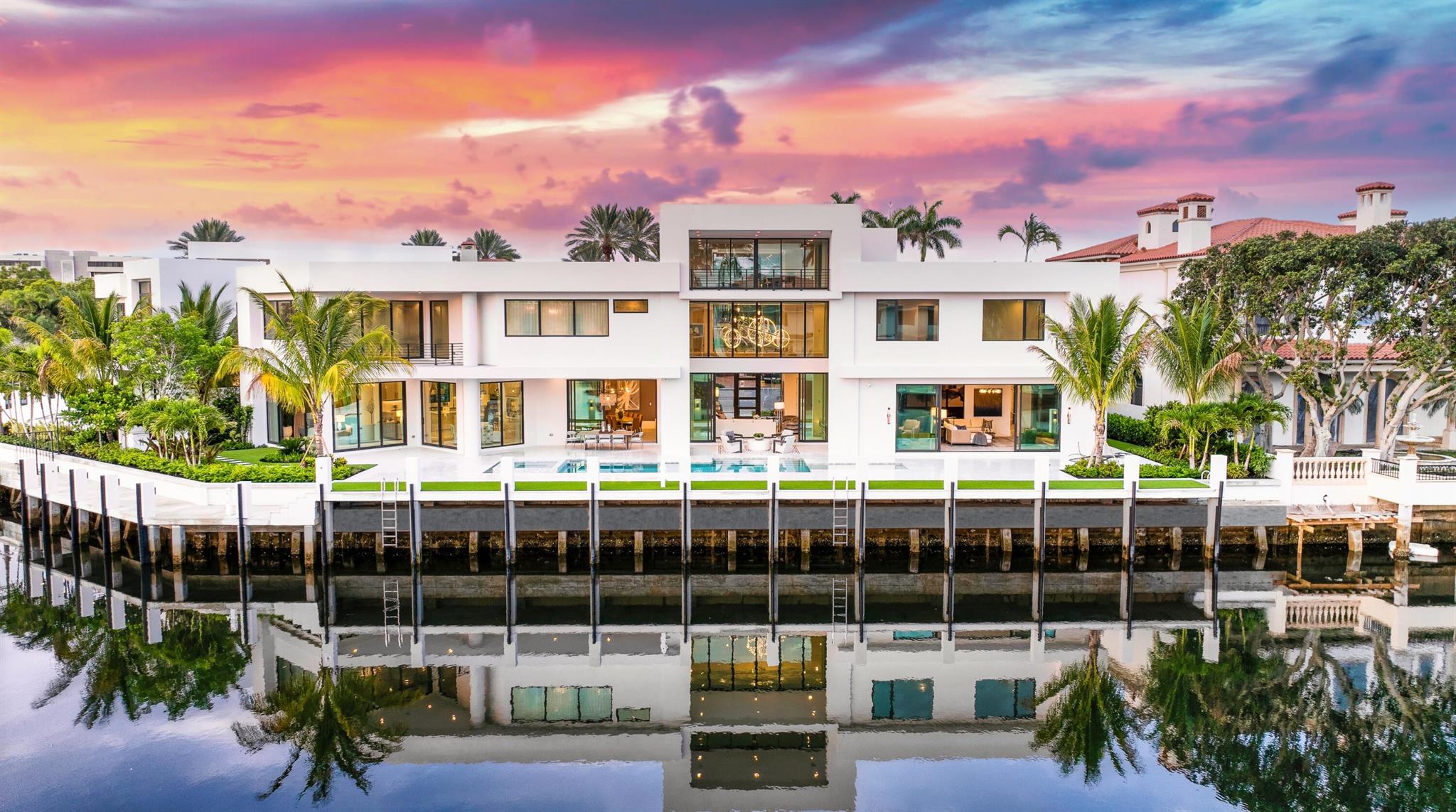 ''New'' Modern/Organic-inspired Sanctuary Point Estate sited on 173+/- feet of wraparound waterfrontage in The Sanctuary by awarding-winning team of Albanese Home Builders, Inc., Quinn Miklos Architects and Marc-Michaels Interior Design. A towering foyer entrance sets the stage for this 3-level estate encased in glass with panoramic water views and tranquil bird preserve setting from all major rooms. Epic primary wing with sleek dual baths and wardrobes and separate lounge. Resort-style pool/spa and patio with entertainment lanai and cabana. Rare, protected mega-yacht side dockage with straight 131+/- feet. The Sanctuary is Boca Raton's highly coveted and private Celebrity Enclave with 24-hour guard house security, road and waterway patrol.  

DISCLAIMER: Information published or otherwise provided by the listing company and its representatives including but not limited to prices, measurements, square footages, lot sizes, calculations and statistics are deemed reliable but are not guaranteed and are subject to errors, omissions or changes without notice. All such information should be independently verified by any prospective purchaser or seller. Parties should perform their own due diligence to verify such information prior to a sale or listing. Listing company expressly disclaims any warranty or representation regarding such information. Prices published are either list price, sold price, and/or last asking price. The listing company participates in the Multiple Listing Service and IDX. The properties published as listed and sold are not necessarily exclusive to listing company and may be listed or have sold with other members of the Multiple Listing Service. Transactions where listing company represented both buyers and sellers are calculated as two sales. The listing company's marketplace is all of the following: Vero Beach, Town of Orchid, Indian River Shores, Town of Palm Beach, West Palm Beach, Manalapan Beach, Point Manalapan, Hypoluxo Island, Ocean Ridge, Gulf Stream, Delray Beach, Highland Beach, Boca Raton, East Deerfield Beach, Hillsboro Beach, Hillsboro Shores, East Pompano Beach, Lighthouse Point, Sea Ranch Lakes and Fort Lauderdale. Cooperating brokers are advised that in the event of a Buyer default, no financial fees will be paid to a cooperating Broker on the Deposits retained by the Seller. No financial fees are paid to any cooperating broker until title passes or upon actual commencement of a lease. Some affiliations may not be applicable to certain geographic areas. If your property is currently listed with another broker, please disregard any solicitation for services. Copyright 2023 listing company All Rights Reserved.

DISCLAIMER: Builder and/or Seller reserve the right to make changes and/or modifications to plans, specifications, features, colors and prices. All plans, elevation renderings, and videos shown are artists' conceptions and are not to scale. The information herein is believed to accurate but not guaranteed and may be subject to errors, omissions and changes without notice. All measurements, dimensions, room sizes and lot sizes are approximate.

Buyer pays title insurance, Florida documentary stamps, and all other closing costs. Taxes are based on vacant land only and subject to change.
