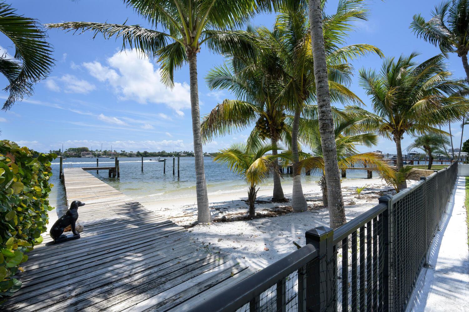 Fabulous Key West Style 5 Bedroom, 4 Bath Direct Intracoastal Pool Home with Amazing Intracoastal Views, a Wonderful Sandy Beach, Ocean Access, and Dock with a Sea Wall situated on an approx. 17, 498 sq. ft. on N. Flagler Drive where New Contemporary homes are emerging with listing prices of up to $39 million. Wonderful Open Floor plan, 2 Car Garage with 1 BD, 1 BA Guest House with Kitchenette with Private entry above the garage. Rare Find, it does not get better than this....Perfect for the Boating Enthusiast with easy access to the Palm Beach Inlet!