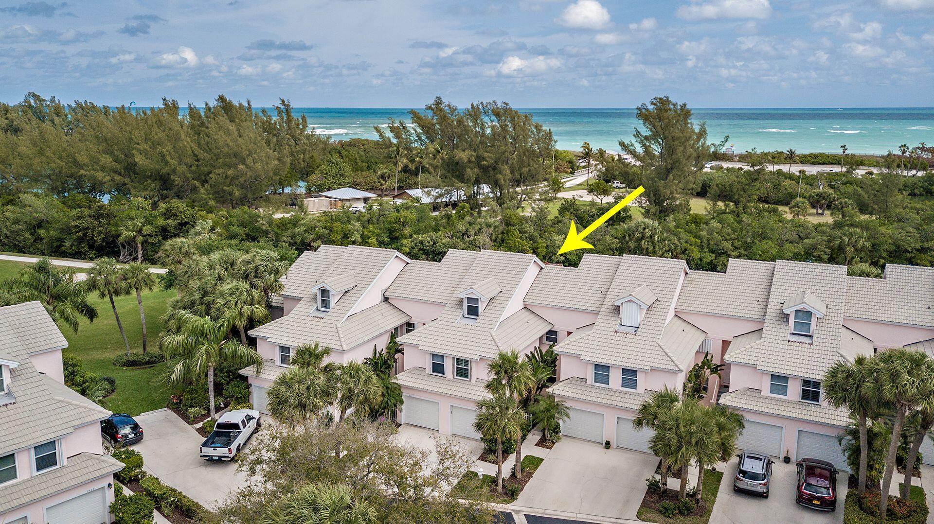 Just Reduced!  Lovely 1st Floor Condo, beautifully renovated on the 14th fairway of the Jupiter Dunes Golf Course. Relax on the impact glass/screened lanai & enjoy the breeze & sounds of the ocean on an eastern exposure, offering peeks of Jupiter's natural estuary.  Recent updates include:  kitchen with granite countertops, custom soft-close cabinetry & stainless steel appliances. All 3 baths have been updated; tile flooring on 1st floor w/luxury vinyl wood plank flooring on 2nd. Additional features: 1 car attached garage; ALL IMPACT GLASS & plantation shutters. Located in Jupiter's Inlet District, this excellent location is in close proximity to Jupiter Beach, Dubois Park, Jupiter Inlet, pool & golf, shops & a variety of waterfront restaurants.  Priced to sell quickly!