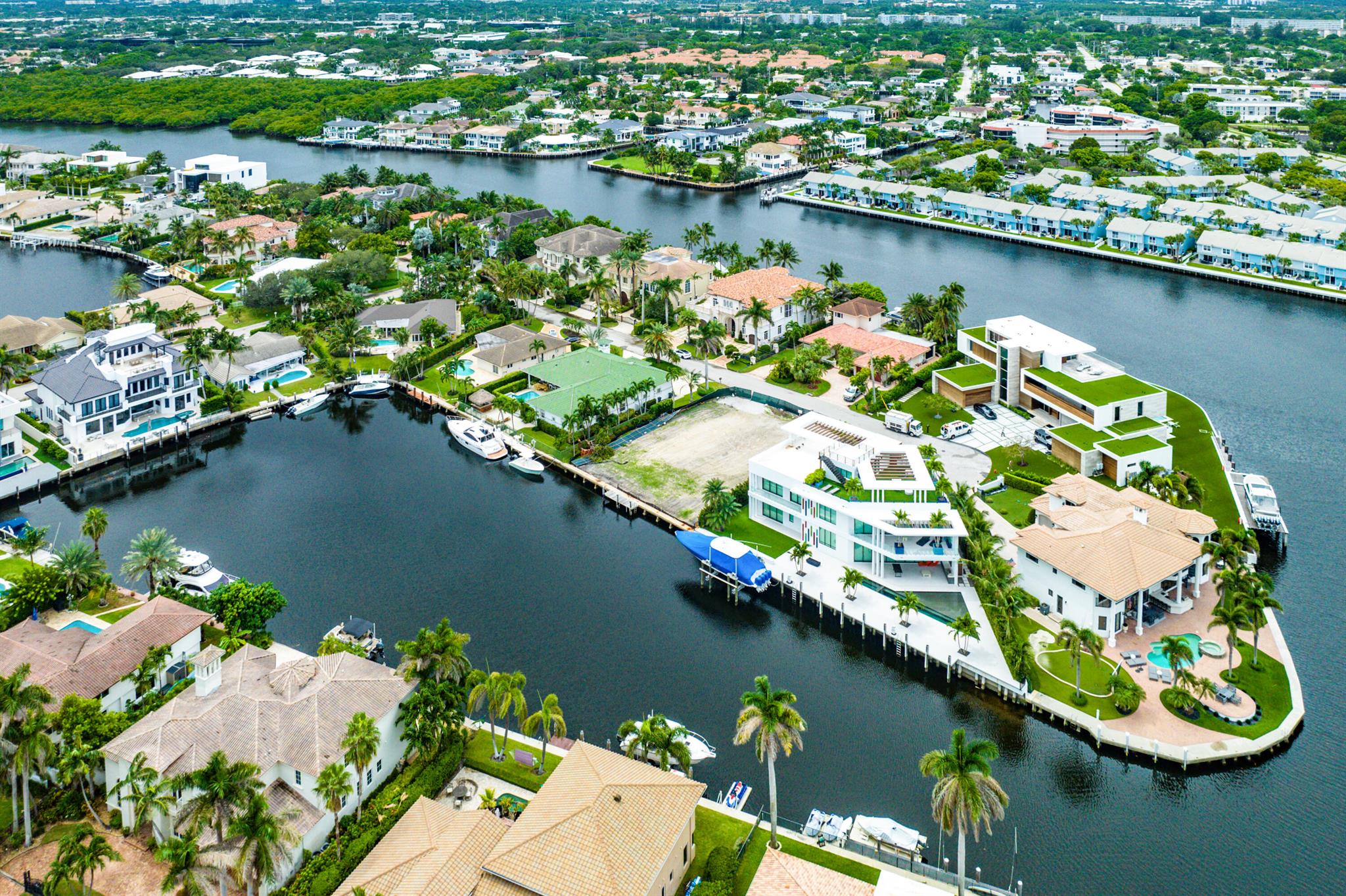 Welcome to 4211 Intracostal Drive, an exquisite gem nestled within the prestigious enclave of Bel Lido in the charming seaside town of Highland Beach. Boasting an expansive lot measuring 100x125, this exceptional property commands breathtaking vistas of the Water Basin, enhanced by a 160ft wide canal that transforms it into a haven for boating enthusiasts.Included in the sale are meticulously crafted plans for a stunning 7200 SQFT contemporary residence which could be expanded to 3 stories high. Ensuring a seamless transition into luxurious coastal living. Embrace the opportunity to create your dream waterfront retreat, where every day is adorned with panoramic water views and unparalleled tranquility. Discover the epitome of coastal elegance at 4211 Intracostal Drive