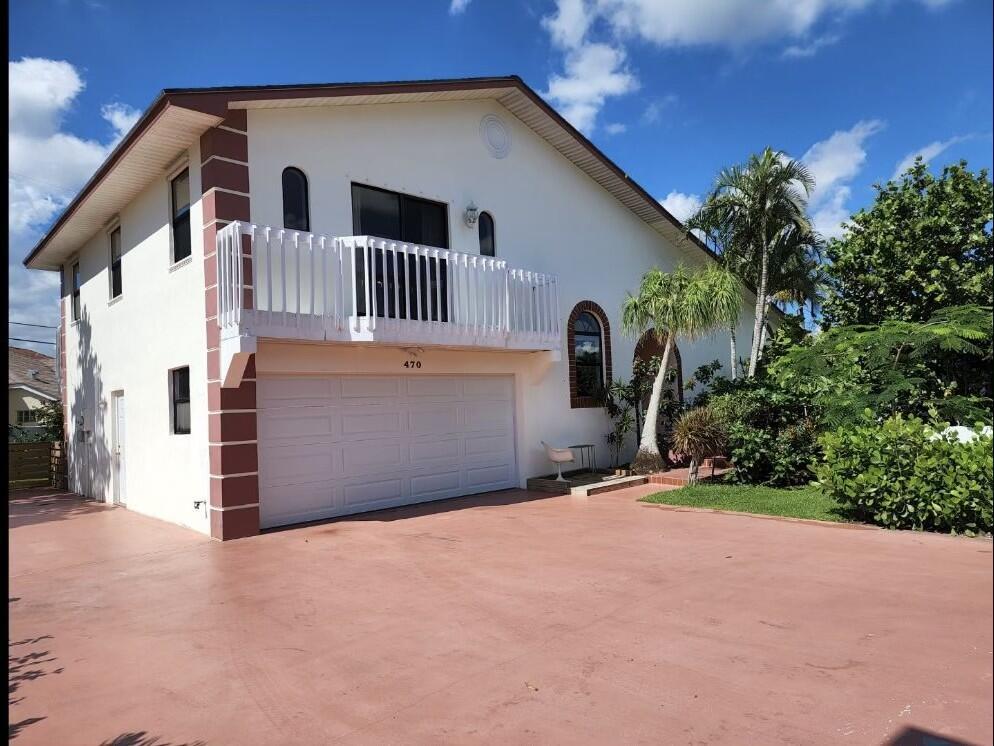 A great canvas to create your dream beach house.  With just a three minute walk to Juno Beach and steps away from a 500 acre Juno Dunes natural area.  House is high and dry on the highest natural dunes in Palm Beach County.  Plenty of parking which is rarity so close to the beach. Come check out this beautiful 3 Bedroom, 2.5 Bath, two car garage, two story CBS home located on the highest lot on the block. Master and second bedroom located on the first floor with vaulted ceilings and tile floors throughout.  Upstairs you will find the loft area/ family room and third bedroom or study area with private balcony.  Step outside on the beautiful patio and enjoy your morning coffee while listening to the ocean breeze.