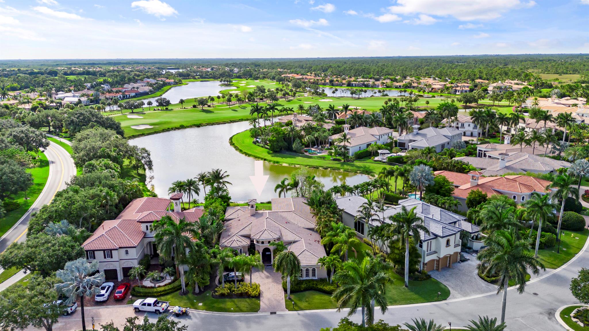 One of the most stunning water Golf Views with western exposure, nestled in Quantera at Mirasol Country Club, GOLF MEMBERSHIP available. This one level masterpiece is walking distance to the club, featuring tranquil sunsets and exceptional privacy. Offering 3,812 square feet of living space, this home offers 3 bdrm, 3 ba, and office on one level providing ample room for  ... comfortable living. The exceptional views seen from the main living areas in the home are surround by lush tropical landscaping, creating a secluded sanctuary. Upon entry, the soaring ceiling and expansive windows in the spacious Living room offer and abundance of natural light. Throughout the home, exquisite details abound, including coffered ceilings, a full wet bar, and a well-appointed office. The kitchen is a delight for culinary enthusiasts, with a gas range, a generous walk-in pantry, wrap-around countertops, central island, open to the family room, with breathtaking views. The primary suite is conveniently located with picturesque views of the expansive lake, golf course and unbelievable sunsets. The VIP guest suites are situated for privacy. The spacious outdoor paradise with newly resurfaced pool, spa and summer kitchen is perfect for relaxing and entertaining. The AC units have been replaced recently. Mirasol Country Club is one of Palm Beach Gardens' most coveted country clubs, boasting a 75,000 square foot clubhouse with multiple indoor and outdoor dining venues, a full-service spa, a state-of-the-art fitness center, a dedicated kids' clubhouse, tennis and pickleball courts, an Olympic-sized pool, kids pool, additional secluded pool and two championship golf courses. This vibrant community offers an array of social activities, special interest clubs and events, ensuring a dynamic lifestyle for its residents.