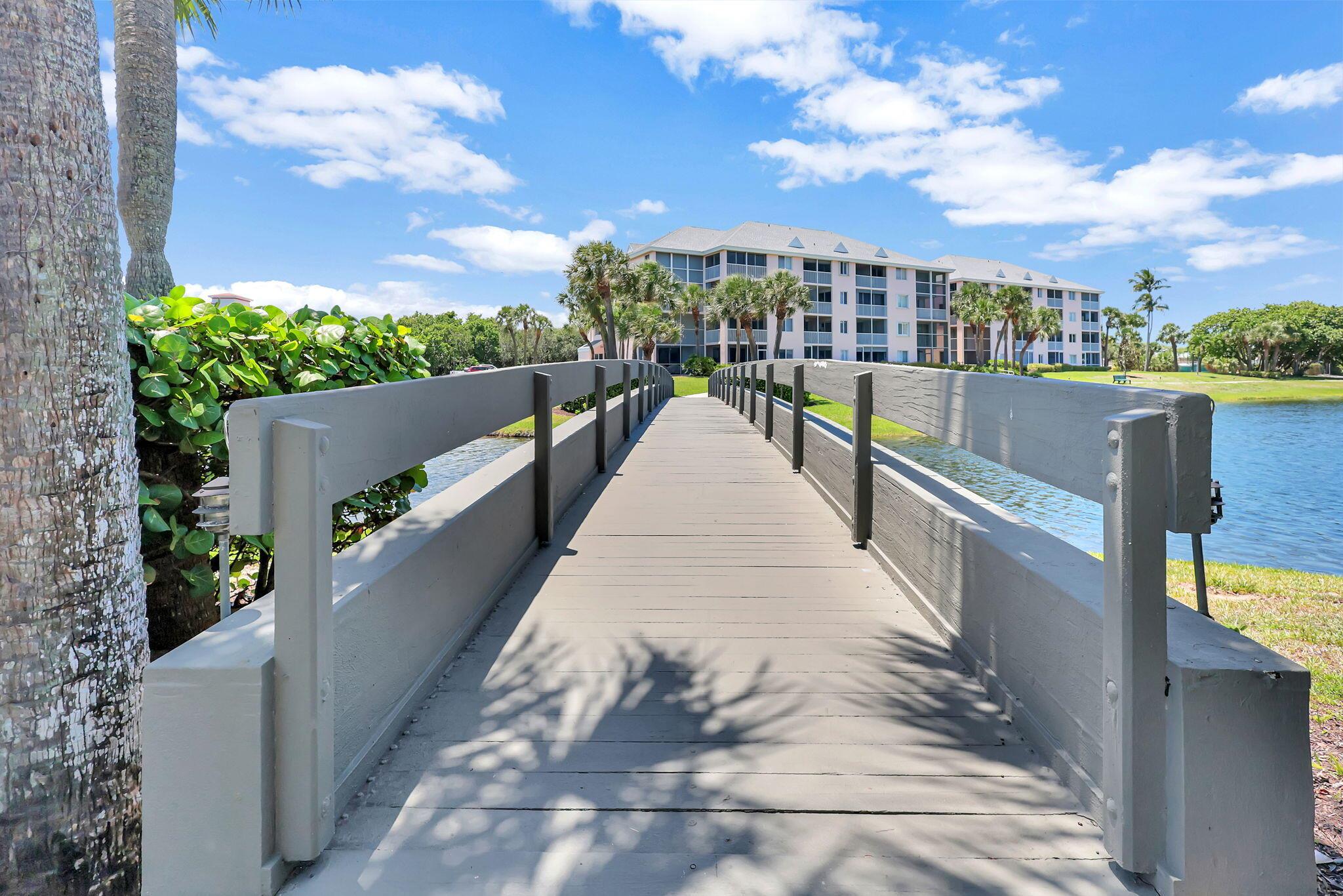 Welcome to Unit C202 in one of Jupiter Beach's most sought-after residences, Jupiter Bay. This 2-bedroom, 2-bath condo boasts gorgeous views throughout the home and offers almost 1,100 square feet, with an open floor concept and a convenient floor plan. Indulge in the ultimate privacy with completely separate hallways leading to each bedroom. Plus, the second bedroom boasts a private entrance from the outside, adding an extra layer of exclusivity to your living space. The condo comes fully turnkey, making it move-in ready and inviting you to unwind and take in the spectacular scenery. The condo's location is unbeatable, with the ability to walk to world-class shopping, sought-after dining options, and entertainment. No rental waiting period once owned. Can rent right away