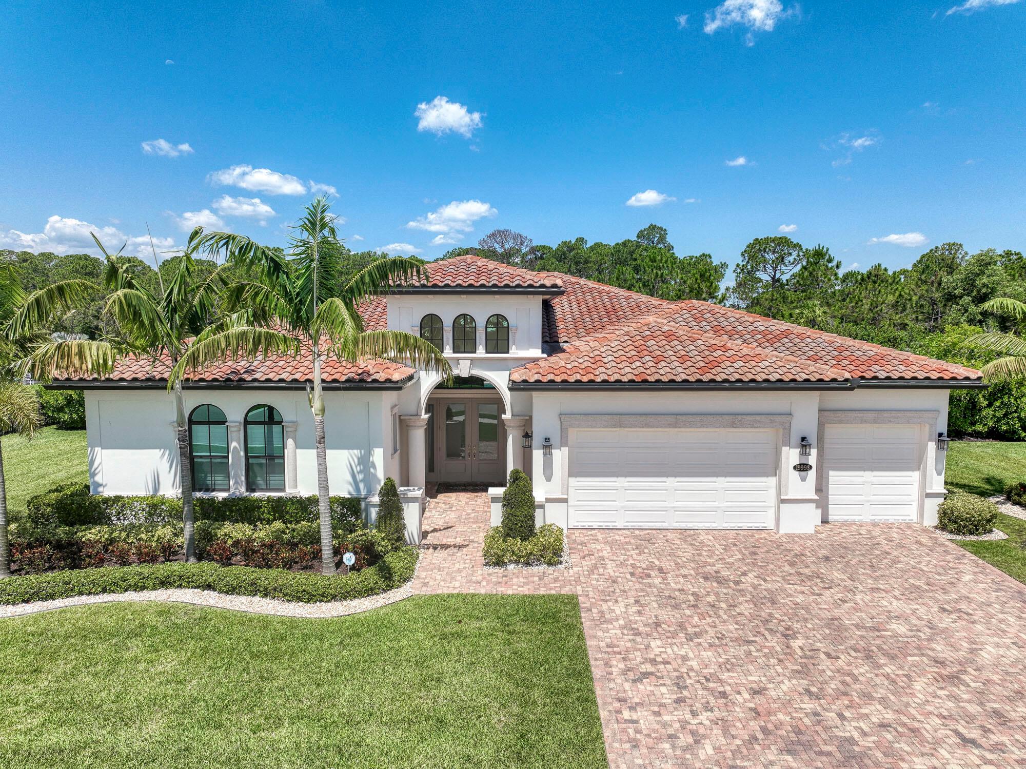 Stunning single-story home in the premier Gated community of Prado.  The home welcomes you with a towering foyer that opens to an expansive great room taking your eyes directly to the resort pool and waterfall. The main living areas feature 12-14ft ceilings and dramatic designer lighting.  Reclaimed white oak wood look tile throughout home is both beautiful and easy to maintain.  The gourmet kitchen features an overside quartz island and walk-in pantry. The large den could be easily converted to 4th bedroom if desired.  The primary bedroom is an incredible 20 x 22 with spa bath and private direct access to lanai and pool.  The resort pool features a sun shelf, spa and waterfall with defined outdoor living, dining and lounge areas.  Select furnishings are available and negotiable.