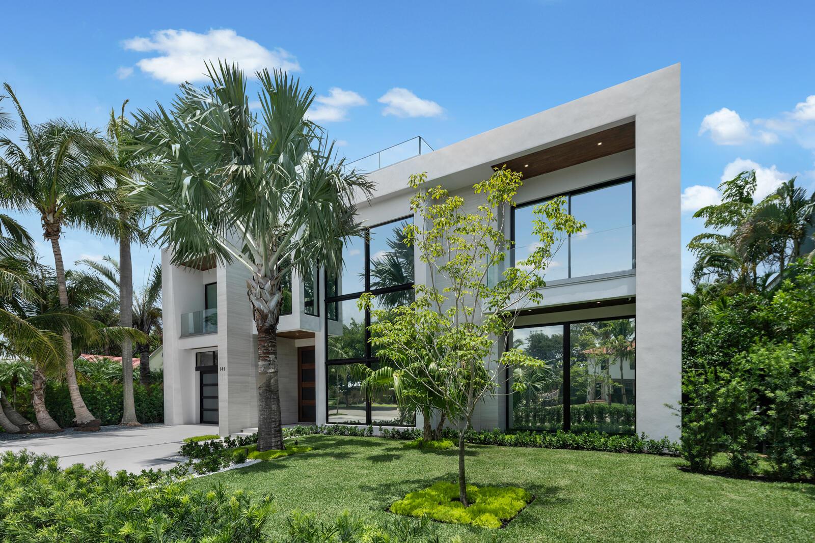 Experience cutting-edge design and comfort at 141 Cortez Rd. in W.P.B.'s prestigious SoSo area, near the Intracoastal. This 6,774 sq. ft. home epitomizes modern luxury, offering sophistication and ease. Highlights include a grand entry foyer with a magnificent staircase, a state-of-the-art media room, and a chef's kitchen with high-end appliances and wood-accented ceilings. The stylish dining area provides pool views. The living room features a fireplace and wet bar, perfect for entertaining. The attached guest house includes a kitchenette and private balcony. The owner's suite boasts dual baths and a balcony overlooking the pool. Enjoy the rooftop deck with stunning views. Additional features include a luxurious elevator, Control4 automation, laundry on both floors, and a 60 kW generator ### Discover Modern Luxury at 141 Cortez Rd., West Palm Beach, FL

Welcome to 141 Cortez Rd., where cutting-edge design meets unparalleled comfort in the heart of West Palm Beach's prestigious SoSo area, just four homes away from the Intracoastal. This extraordinary home boasts 6,774 sq. ft. of air-conditioned space and is a testament to modern luxury, offering a lifestyle of sophistication and ease.

As you approach, the sleek lines and contemporary architecture set the tone for what lies within. The grand two-story entry foyer and the sophisticated modern staircase to the right are truly magnificent. Inside, every detail has been thoughtfully designed for contemporary living, with the finest LED cove lighting and accent lights from Environmental Lights enhancing the ambiance throughout the home.

The state-of-the-art media room is wired for an immersive cinematic experience, while the spacious first-floor office offers a tranquil workspace bathed in natural light. The chef's kitchen is a modern culinary haven, boasting wood-accented ceilings, high-end appliances, and an inviting eat-in island perfect for casual gatherings.

The separate dining area, accented with a decorative wood ceiling and complemented by floor-to-ceiling glass views of the pool, adds a touch of elegance to every meal, while the living room's fireplace and wet bar make it the ultimate space for entertaining.

The attached guest house is a modern marvel, featuring its own kitchenette and private balcony. Overlooking a stunning 36 ft. pool with a 10 ft. sun shelf and spa, this space ensures your guests enjoy luxury on par with the main residence. The poolside area also includes a fully equipped outdoor kitchen, perfect for al fresco dining and entertaining.

The owner's suite redefines opulence with its dual side-by-side master baths and grand balcony overlooking the pool, creating a serene retreat for relaxation. All three guest bedrooms feature deluxe ensuite bathrooms, offering privacy for family members and guests.

Imagine sipping your morning coffee on the tiled roof deck, where glass railings offer uninterrupted views of the tranquil waters. The deck is perfect for entertaining, equipped with gas and water hookups for future use like a summer kitchen.

Technological innovation and convenience are at the forefront of this home's design. The home features a luxurious elevator and laundry facilities on both the first and second floors. It is also equipped with Control4 automation and lighting and is wired for Lutron Sivoia QS shades,  making every aspect of this residence controllable with ease. There is also a wired security system and high definition cameras as well as built-in speakers that play streaming media throughout the home and loggia.   A whole home 60kW Kohler generator ensures that comfort and convenience are never compromised.

141 Cortez Rd. is more than just a home; it's a sanctuary of modern luxury. Whether you're lounging by the pool, enjoying a film in the media room, or simply relaxing in your master suite, this residence offers a perfect blend of cutting-edge technology and refined elegance. Welcome to the future of living in one of West Palm Beach's most sought-after neighborhoods.