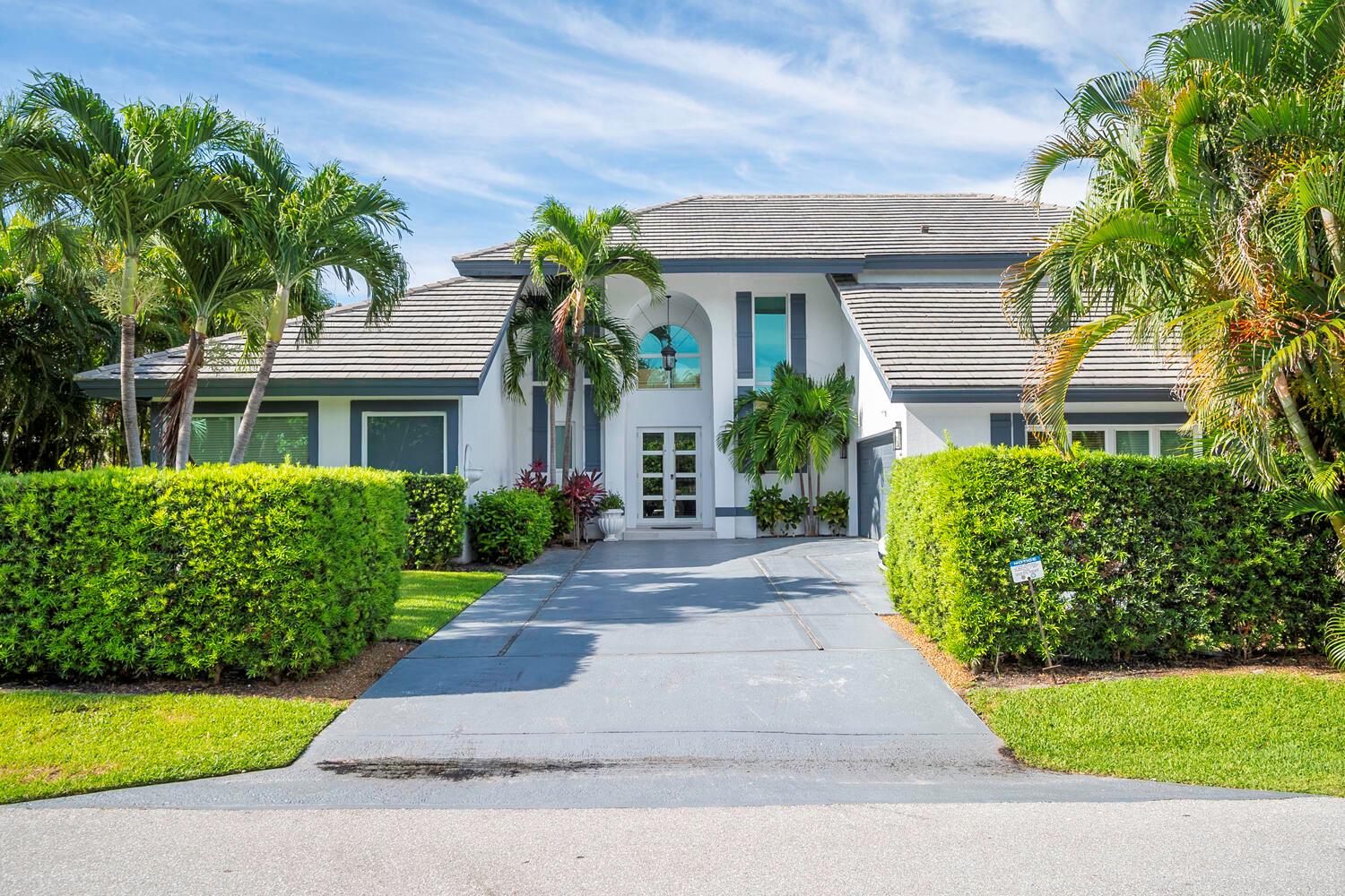 Beautiful beach home East of A1A in Ocean Ridge. Amazing location, just a 4 minute walk to a private beach. This inviting home has high ceilings and large impact windows, making the space bright, open, and homey. The large kitchen island makes the space suitable for gatherings or cozy family dinners. This home was recently updated. Fully furnished and beautifully decorated. Heated pool and outdoor awning make the backyard comfortable to spend time in at any time of the year.