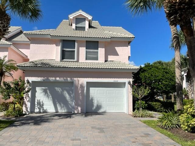 Available 2025 Season! Walk to the turquoise waters of Jupiter Beach from this 2nd floor, 2 bedroom, 2 bath + loft, END UNIT townhouse on the 17th green of the Jupiter Dunes golf course. Enjoy the relaxed atmosphere in The Estuary, play golf in the morning & walk miles of sandy beach in the afternoon. New wood plank tile flooring through main living area & bedrooms; gorgeous new primary bath renovation; stunning new Kitchen renovation with 42'' white Shaker cabs, quartz c-tops & SS appliances.  King bed in primary & twin beds in guest room. Relax on the screened lanai overlooking the golf course. Park your car in the garage & walk to Jupiter's favorite attractions. Just a short stroll to the beach park, golf and numerous waterfront restaurants. A perfect beach retreat!