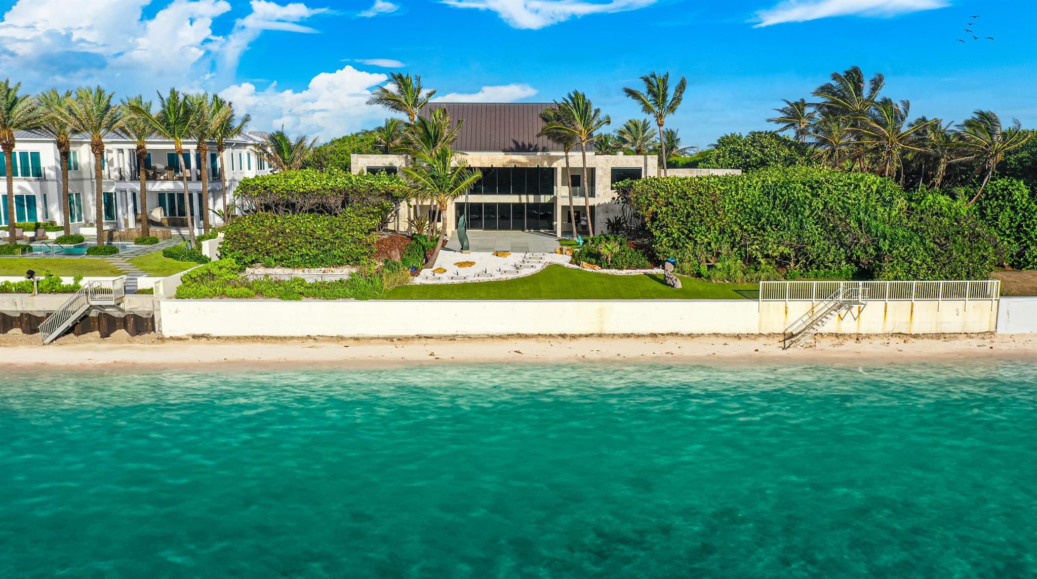 With renovations now complete, this high-elevation, coquina-clad estate presides over 150 feet both on the ocean and Intracoastal. A stunning collaboration between an award-winning architectural firm and renowned landscape architect, this luxe showcase captures the essence of opulence and excellence, with lofty ceilings, ocean-view window walls, a koi pond, sculpture gardens and cascading fountains. All Artwork, statues, paintings, sculptures(attached or unattached)are excluded from the sale of this property

The information herein is deemed reliable and subject to errors, omissions or changes without notice.  The information has been derived from architectural plans or county records. Buyer should verify all measurements.

DISCLAIMER: Information published or otherwise provided by the listing company and its representatives including but not limited to prices, measurements, square footages, lot sizes, calculations, statistics, and videos are deemed reliable but are not guaranteed and are subject to errors, omissions or changes without notice. All such information should be independently verified by any prospective purchaser or seller. Parties should perform their own due diligence to verify such information prior to a sale or listing. Listing company expressly disclaims any warranty or representation regarding such information. Prices published are either list price, sold price, and/or last asking price. The listing company participates in the Multiple Listing Service and IDX. The properties published as listed and sold are not necessarily exclusive to listing company and may be listed or have sold with other members of the Multiple Listing Service. Transactions where listing company represented both buyers and sellers are calculated as two sales. Cooperating brokers are advised that in the event of a Buyer default, no financial fee will be paid to a cooperating Broker on the Deposits retained by the Seller. No financial fee will be paid to any cooperating broker until title passes or upon actual commencement of a lease. Some affiliations may not be applicable to certain geographic areas. If your property is currently listed with another broker, please disregard any solicitation for services. Copyright 2024 by the listing company. All Rights Reserved.