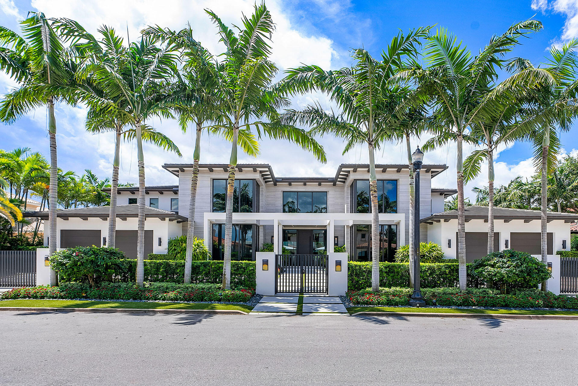 Discover the epitome of luxury in this nearly new deep-water estate on 131' of waterfront, masterfully crafted by CJM Builders and elegantly designed by Marc Michaels. This stunning haven boasts a modern transitional interior and an impressive 111' dock with power to accommodate a grand yacht.Indulge in the outdoor oasis, featuring an infinity pool/spa, a summer kitchen with state-of-the-art appliances, automatic pocketing doors, and Phantom screens that seamlessly blend indoor and outdoor living. The chef's kitchen is a culinary masterpiece, equipped with premium Gaggenau appliances, sizeable dual center islands, and a butler's pantry.