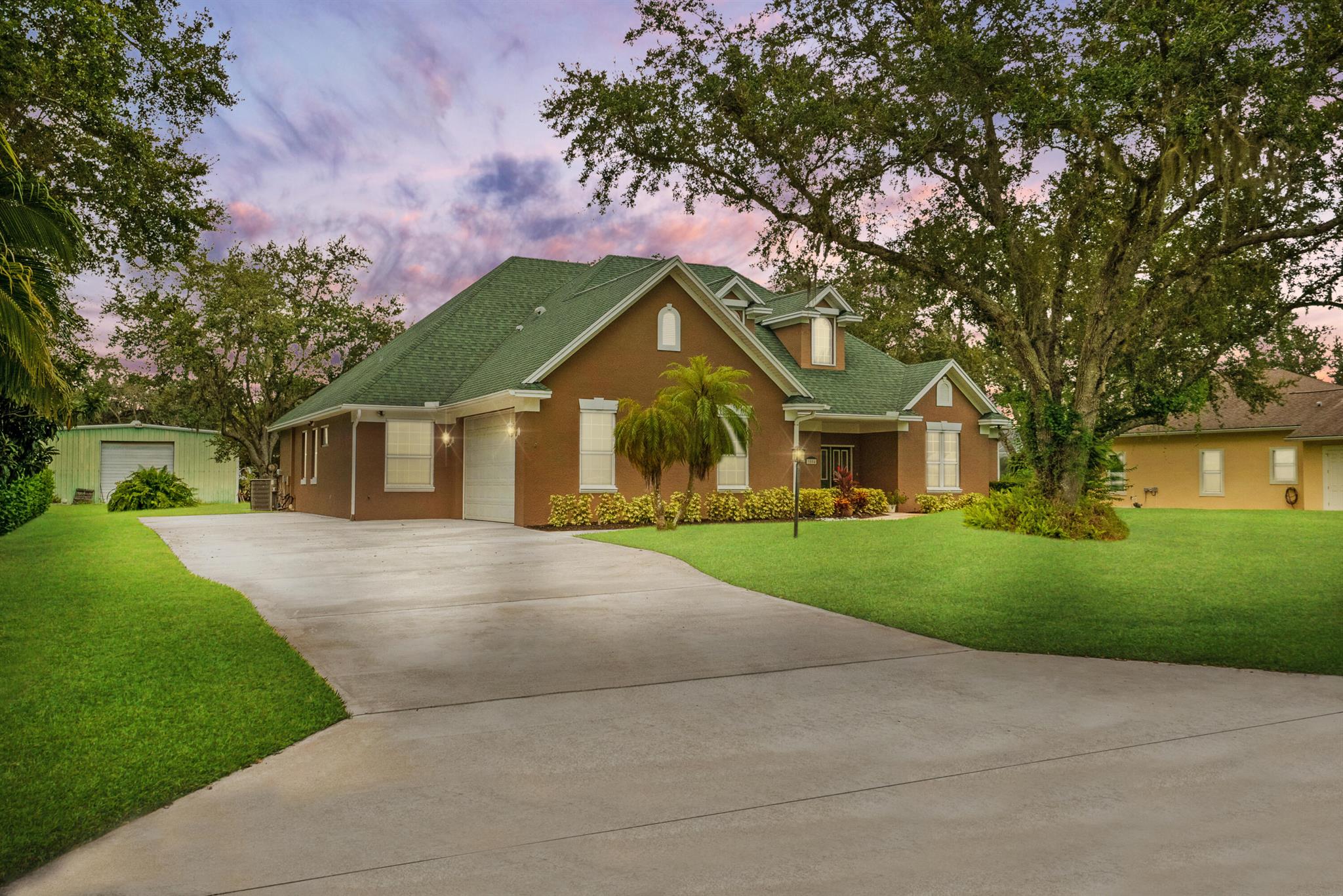 Welcome to your Forever Home! Lost Tree Estates is a boutique style community with just 28 custom homes & they rarely go for sale! 3004 Lost Tree Blvd is one of a kind, sprawling over 2700 sq ft with 10ft ceilings, 8 ft interior doors & rounded corners. Situated on a .5-acre lot the expansive driveway is already set up for your RV, with a 30amp power, water & sewage hookup. Drink your morning coffee under the covered patio overlooking the screened in heated/salt pool (Pool Pump 2022). In addition to having 3 beds, & 2 1/2 baths, there's an office, separate media room, formal dining room, formal living room, breakfast nook & family room. Roof (2013) Water Heater (2024) full window/door hurricane shutters, R30 Insulation, irrigation system powered by a well, freshly painted interior.