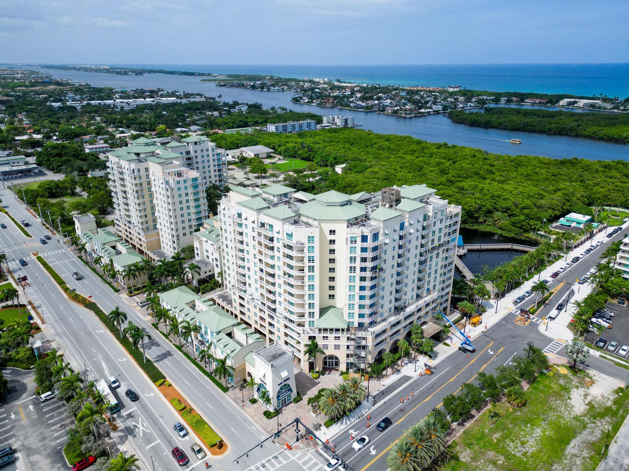 Welcome to luxury living in Boynton! This stunning corner unit condo on the 12th floor features a split floorplan of 2 bedrooms and 2 bathrooms.  The beautiful kitchen includes granite countertops, a bar island and stainless-steel appliances, including a Samsung smart refrigerator with Bluetooth. The apartment boasts new waterproof laminate flooring throughout. An extended private balcony offers southeastern and western exposure, providing breathtaking city sunsets and stunning ocean views. Washer and dryer inside the unit. This luxury building has amenities to include dog washing station, two pools, sauna, garage parking, steam room, fitness center, concierge services, and complimentary valet and much more. Located just 1 mile from the beach walkable to downtown Boynton! Rent right away!