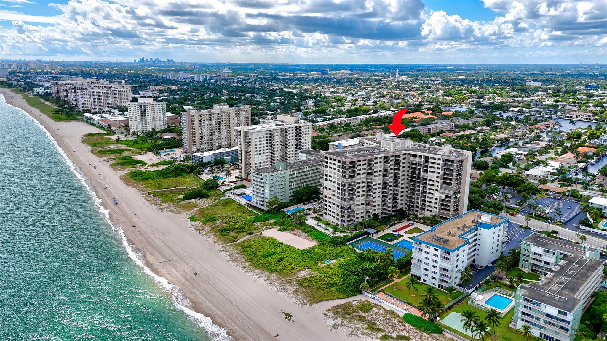 This stunning condo, completely renovated into a coastal paradise, is nestled between the Oceanfront and the Intracoastal Waterway, offering breathtaking panoramic views. The interior showcases exquisite design, with solid core designer doors and carefully selected stone countertops, creating an elegant and modern atmosphere.  The transformation of this condo allows for abundant natural light, achieved by removing walls to create an open, airy ambiance. It features four bedrooms and four and a half bathrooms, ensuring ample space and luxury. The updates extend to new LED lighting fixtures, electrical and plumbing systems, and two new AC units and water heaters, providing efficiency and comfort. This unit will have new impact windows and doors installed in late August or September. (MORE) The transformation of this condo brings in abundant natural light, achieved by taking down walls to create an open and airy ambiance. It comprises four bedrooms and four and a half bathrooms, ensuring ample space and luxury for its inhabitants.The modernization extends to the lighting with all-new LED fixtures, electrical, plumbing, as well as two new AC units and water heaters, providing both efficiency and comfort. What's more, all assessments have been generously covered by the seller, ensuring a seamless transition into this revitalized living space. The building itself is one of the largest properties in Lauderdale by the Sea, situated directly on the ocean's edge, presenting captivating views of both the sea and the intercoastal. As if that weren't enough, this residence offers an array of outdoor amenities to enjoy. From tennis and pickleball courts to a beachfront volleyball court, putting green, cornhole, and bocce ball, there's no shortage of activities. You'll also find a beautiful pool on the sand, accompanied by ample outdoor entertainment space, complete with fire pits, a tiki hut, and grilling areas. It's worth noting that the building is currently undergoing an extensive revitalization and concrete restoration, with all assessments covered by the seller. This means that not only will you be stepping into a luxurious haven but also building equity as the project is completed. This condo is a coastal dream turned into reality, offering an idyllic blend of modern comfort and seaside paradise. ALL ASSESSMENTS HAVE BEEN PAID BY SELLER OVER 250K. This building is set to compete with all the NEW buildings like the Ritz, Waldorf Astoria, Casamar, and Sabia, without the NEW Construction prices. Owner Financing available with 50% down.