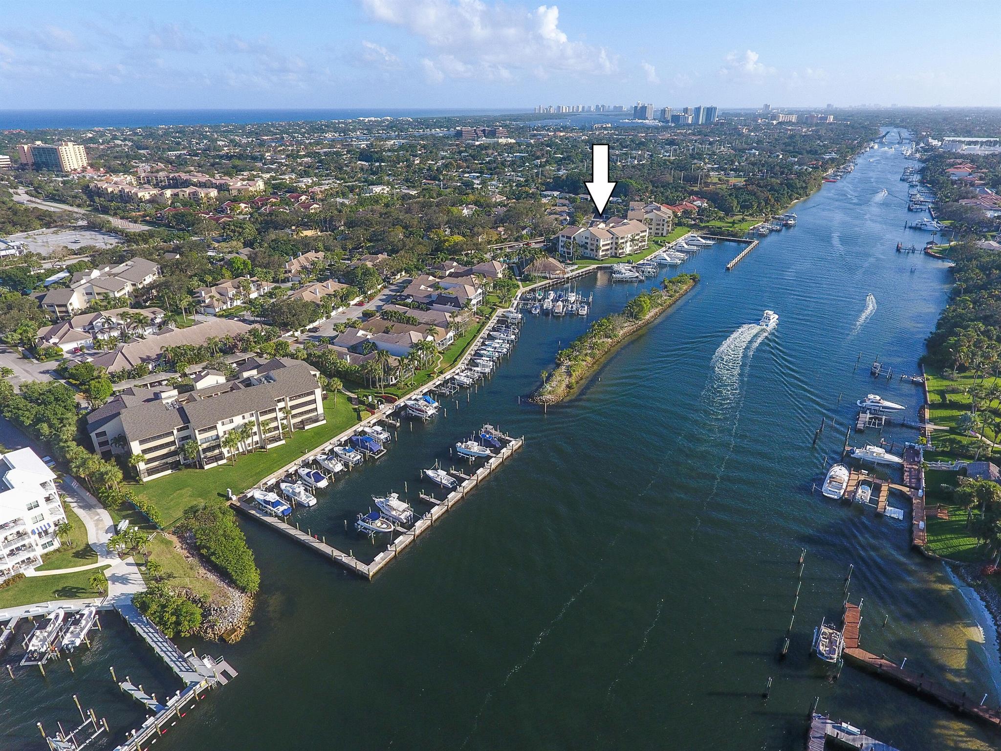 Oak Harbour is a quaint, gated waterfront community that sits right on the intracoastal waterway. The neighborhood has lush oak trees that provide great shade throughout the community. The condo has been completely remodeled with brand new Italian white tile flooring throughout. The kitchen also has beautiful new white quartz countertops and all new handles installed on the cabinets. The bathrooms have brand new cabinetry, mirrors, lights, showers and toilets. Enjoy a slight water view from the back patio with a door to the outside. The condo is close to the marina and all the clubhouse amenities. The marina has day docks and slips for lease are subject to availablilty. The community has two pools, a jacuzzi, pickleball, tennis courts, outside grills and is just minutes from the beach!