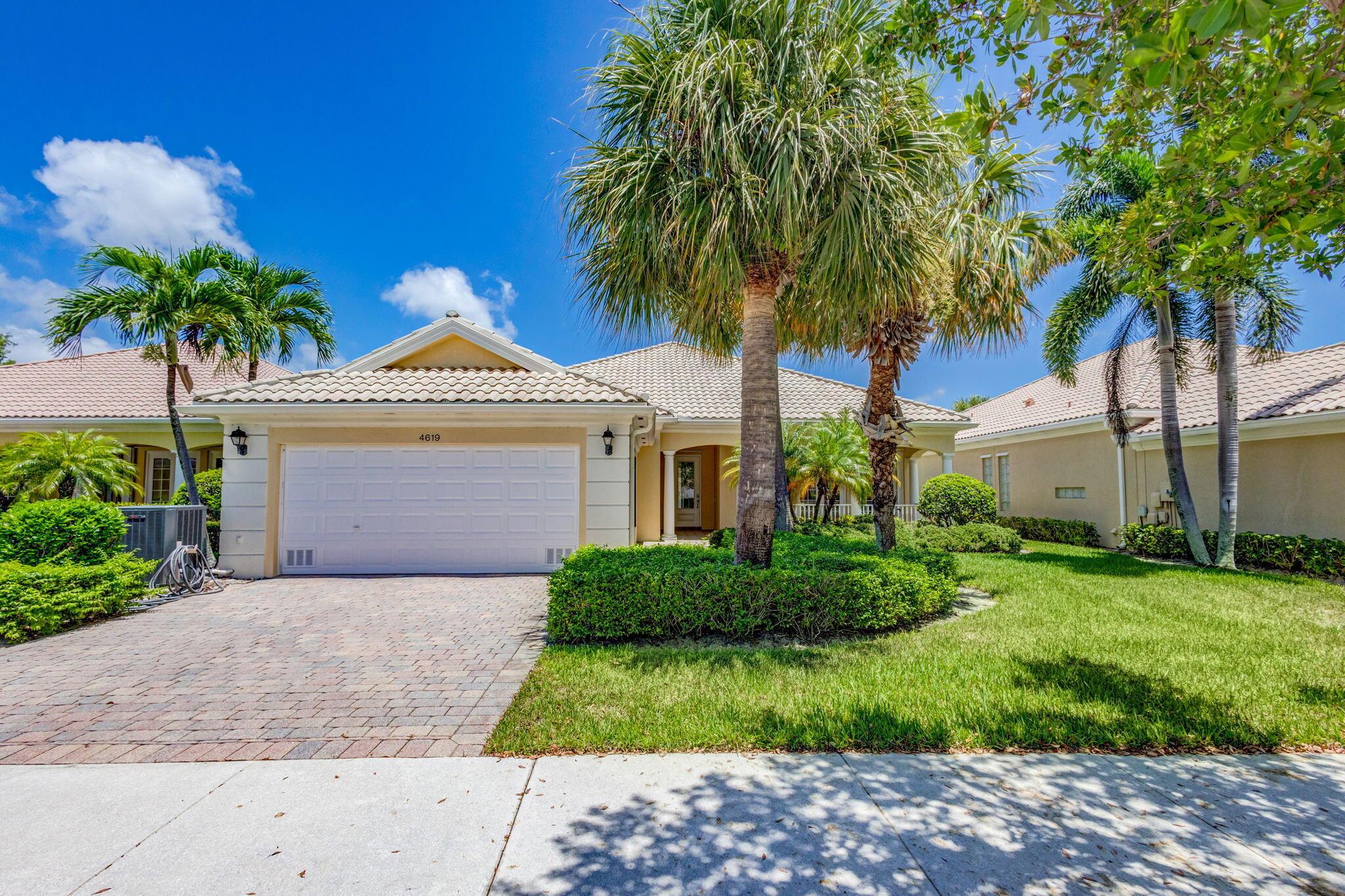 Spacious 4-bedroom, 3 bathroom, single story pool home centrally located in the gated community of Magnolia Bay.  This Divosta built Carlyle model overlooks the lake and was extended to include 2,723 square feet under air.  The interior of the home features an open floor plan, which is great for entertaining,  along with a formal living room with tons of natural light and a spacious dining room.  The AC was replaced in 2023.  The master bedroom is located in the rear of the home and has sliders leading out to the pool area.  There is a guest bedroom on the other side of the home overlooking the pool and two more bedrooms off the front hallway.  The 4th bedroom is a great spot for a home office or den. There are two sets of sliding glass doors in your extended living area that lead out to the pool area, which is a great spot to enjoy the South Florida lifestyle.  The large front porch with a Southern exposure is a great spot to enjoy your morning coffee or evening glass of wine.  
Magnolia Bay is located in the sought after city of Palm Beach Gardens and offers residents a resort style community pool, clubhouse, fitness center, tennis courts and playground.  You are only minutes to World class shopping, dining, golf and some of South Florida's best beaches.  PBIA and downtown WPB are only 20 minutes away.