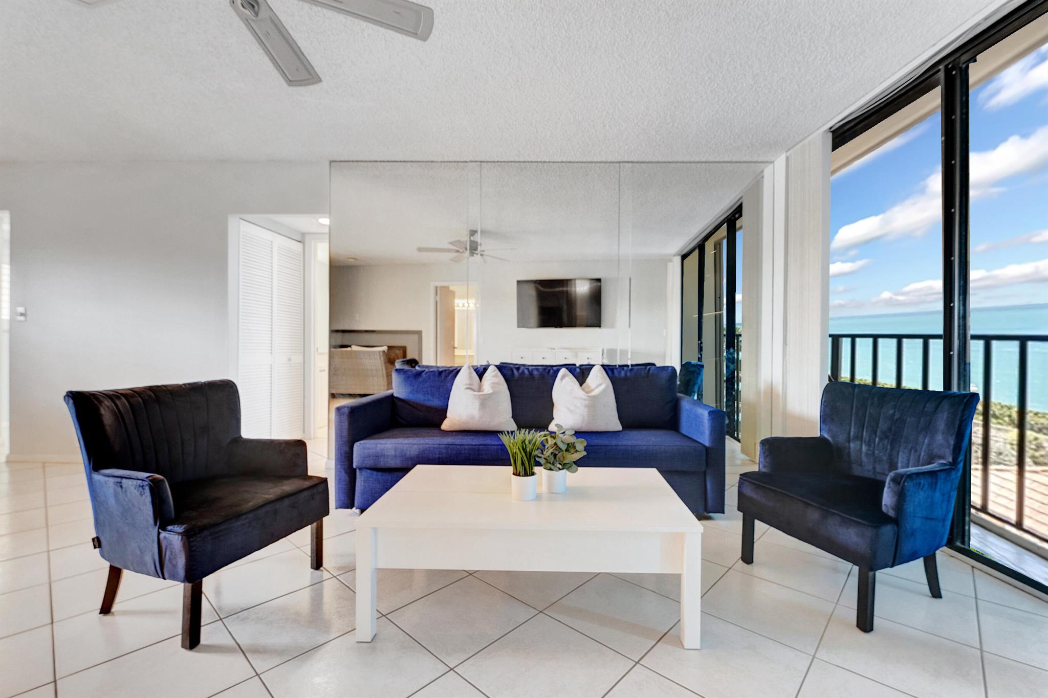 Mesmerizing sights from this oceanfront condo will elevate your soul! An airy living room welcomes abundant sunshine and opens to a balcony defined by ocean breezes, live dolphin shows, and dramatic sunrises. Both bedrooms enjoy sweeping views of the pool and sandy beach. Storage is abundant; a walk-in closet in the primary suite awaits your golf & beach gear. Ocean Trail offers an exquisite, active lifestyle of pristine shores, trails, fitness, tennis, pools, grills, saunas, hot tubs, social rooms, garage parking, security, staffed lobbies, and a gate guard. This is the ideal residence to enjoy the many wonders of Jupiter. Just steps from the inlet, a luxury resort & spa, 2 theaters, mini golf, boat storage, an 18-hole golf course, salons, shops & restaurants. Local golf cart taxi too!