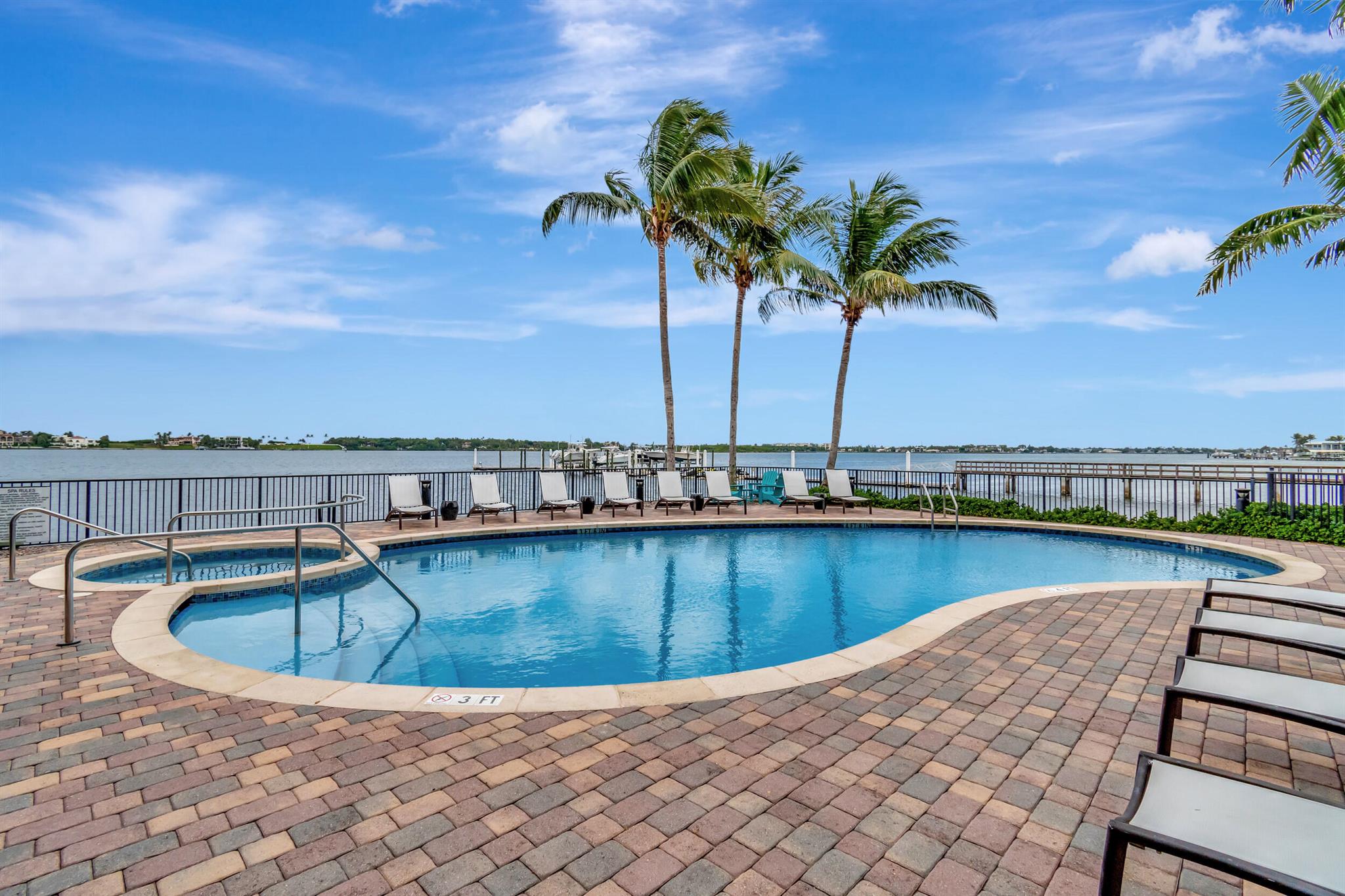 GET YOUR BEACH VIBE ON! This is the perfect seasonal townhouse rental in a luxurious intracoastal community in Boynton Beach. This beach house is decked out in true beach fashion and decor. The property features 4 spacious bedrooms, 3.5 baths, 2 car garage and large living area. One of the bedrooms with an ensuite bath is located on the main level. The 3 additional bedrooms are on the top level. The gated community includes a gym, pool with hot tub, billiards & bbq area right next to the intracoastal waterway. A great place to soak up the sun and watch the yachts cruise by. Be at the beach in no time and enjoy a nice lunch oceanside at the Dune Deck Cafe or treat yourself to a relaxing day at the Eau Spa in Manalapan, all within about a 10 minute drive. Available Oct-April, min 90 days.