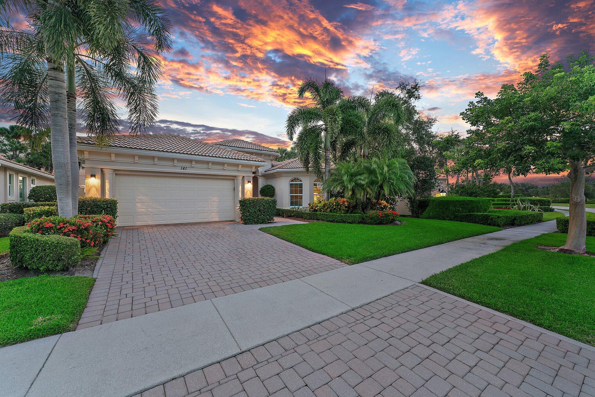 Stunning One of Kind CUSTOM Golf Home in Jupiter Country Club!  GOLF MEMBERSHIP is available but not required. This spacious CBS home sits on a Prime corner lot with Lake AND Golf views, bordered by enchanting landscaping.  Built in 2013 this Impeccable home features Full Impact Glass and Energy Efficient Construction!  Double door entry leads to a bright + airy great room w/ 12' triple coffered ceilings.  Design elements include porcelain tile floors, plantation shutters,  solid core doors and crown molding.  The kitchen features upgraded wood cabinetry, stainless appliances, custom backsplash and a 5 burner range w/ ceiling vent.  A breakfast nook and formal dining room offer a variety of seating options.  A cozy sunroom offers additional space for relaxing or entertaining. The primary The primary bedroom is grand in size and set apart from the others.  A luxe bath and dual closets with built ins add a lovely finishing touch.  All bedrooms feature wood floors.  The Saranac floorplan is one of the most popular in JCC and THIS is the only one with a 3rd Full Bath + a custom Sunroom!   The sunroom overlooks a SPECTACULAR NEW Pool + Spa, surrounded by luxury tumbled marble decking.  The state of the art pool (3 year warranty) features salt chlorination, a Sun shelf, on demand lighting and a mobil app for temperature control.  You will fall in love with the Jupiter Country Club lifestyle, in North County's Newest golf + club community!   Enjoy an easy walk to the Tennis Courts + Clubhouse, and enjoy the beautiful lit sidewalks and nearby walking trails.  Golfers will love the Greg Norman signature course that comes with Reciprocal privileges!   Non golfers can soak up the Resort amenities (see photos).   JCC is in Jupiter's #1 School Zone!   Just minutes to best Beaches, shopping, dining and cultural venues... Truly a Fabulous place to Live!