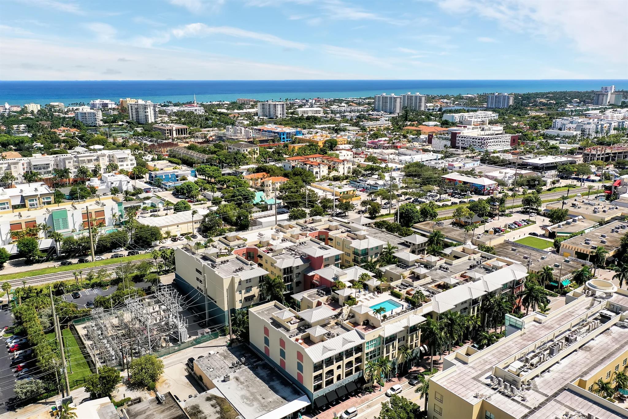 In the heart of Downtown Delray Beach, this stylish 2-bed, 2-bath condo offers unmatched convenience and luxury. Just steps from Atlantic Avenue and minutes from the beach, it's also close to Old School Square and The Ray hotel. Inside, enjoy sleek tiled floors, high-end quartz countertops, and in-unit laundry. The master bedroom features a spacious walk-in closet. Residents can relax by the heated pool, barbecue in the outdoor dining area, or savor breathtaking sunsets from the rooftop pool deck. This condo is the perfect blend of modern comfort and urban sophistication.