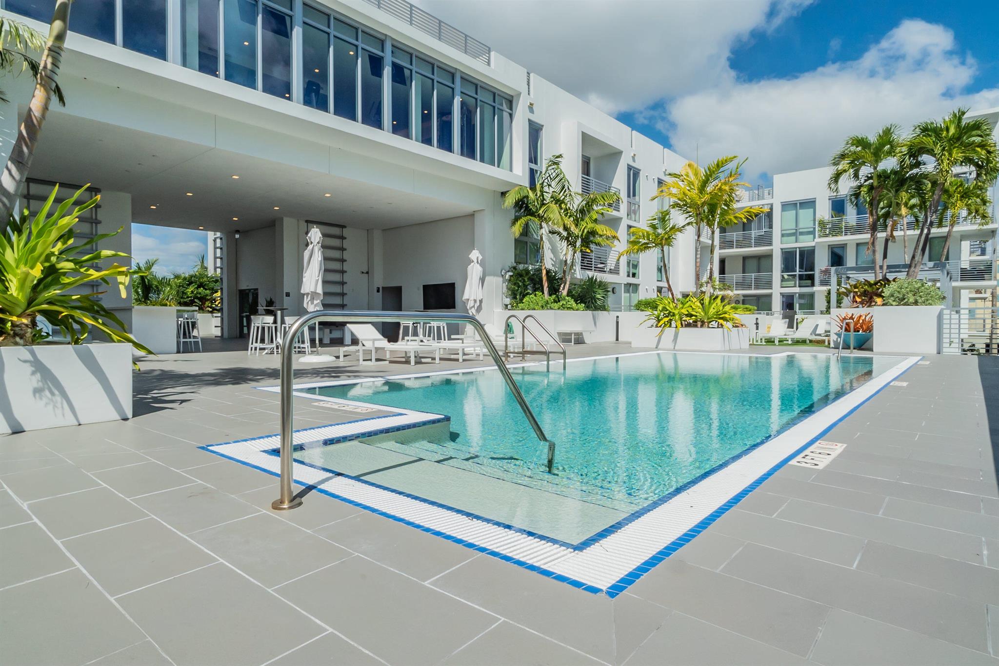 Hey, luxury seekers! Today, I'm taking you inside one of the most coveted addresses in Delray - the stunning 111 First Delray luxury condo. Imagine waking up every day where style meets comfort right on the pool deck. Let's dive in! First off, the location is unbeatable. We're talking a stone's throw from the pulsating heart of Delray - yes, just one block away from the world-famous Atlantic Ave. Picture this- every five-star restaurant, trendy lounge, and chic boutique right at your fingertips. .. Now, step inside this beautiful condo. It's not just a living space; it's a statement. Fully furnished and turnkey, every inch oozes luxury. High end finishes are the standard here, not an exception. The plush furniture, the elegant decor it's all curated to offer the utmost comfort and style.