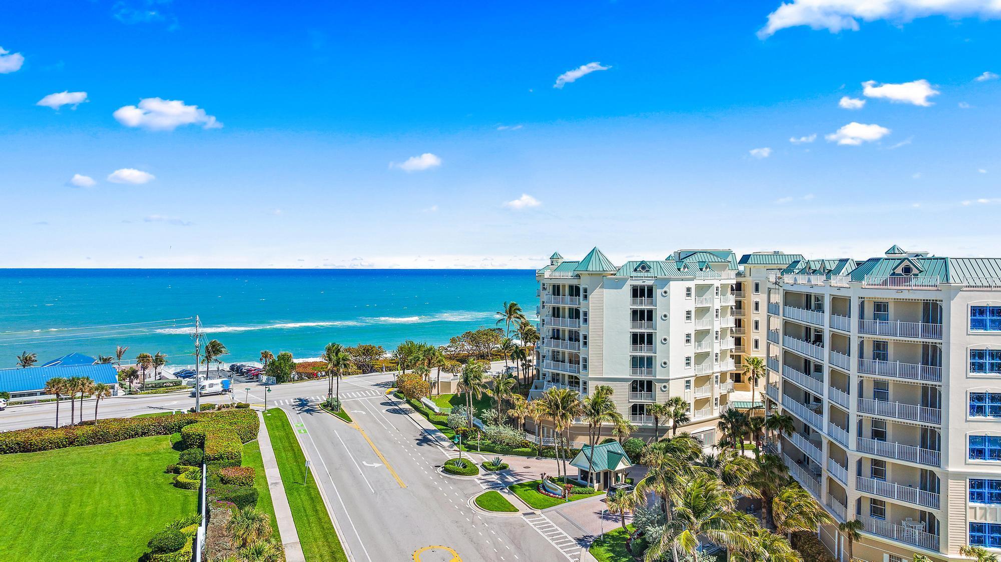 Breathtaking turquoise ocean views & majestic sunrises await as you enter this condo in one of Jupiter's most desirable seaside locations. Welcome to this 4th-floor unit located in one of the oceanfront buildings at the luxurious Jupiter Ocean Grande. Embrace Florida weather & ocean breezes year-round from either of the 2 oversized balconies. The home also offers 3 spacious bedrooms with en-suites & balcony access. Other features include an open living area, breakfast nook, in-unit washer & dryer, plenty of storage space & more. Jupiter Ocean Grande offers the ultimate lifestyle in paradise with premier & recently renovated amenities. Amenities include a 24-hour manned gated entrance, resort-style pool & spa, fitness centers, club room, billiard room, tennis & pickleball courts... , card room, 2 covered garage spaces, an extra air-conditioned storage area and more. Large dogs &amp; pets are welcome in this condo. Original owner. Close to fine dining &amp; shopping. Pet-friendly beach across the street.