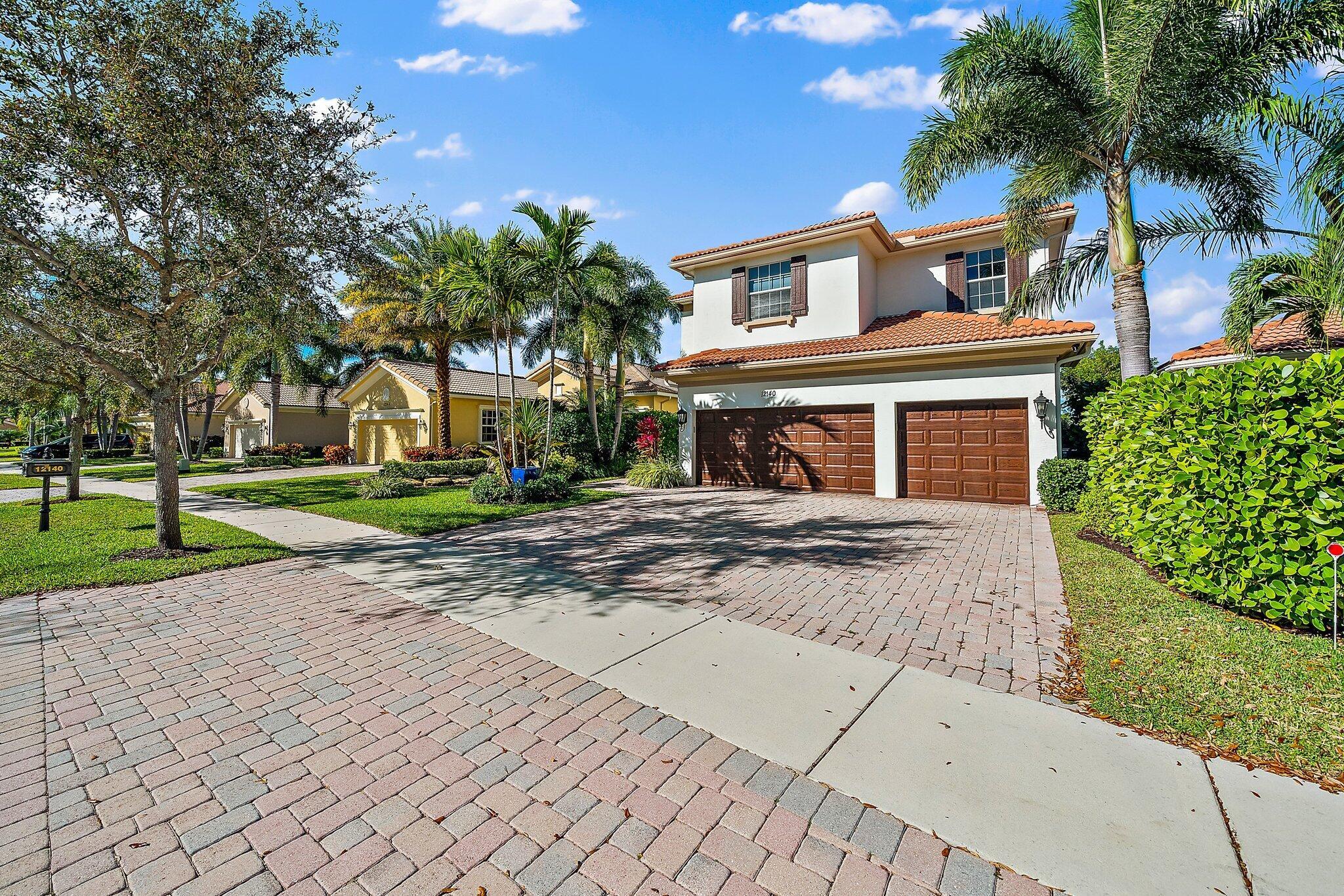 Located in the gated Paloma community in Palm Beach Gardens, this 5-bed, 4-bath property is a luxury lakefront dream with stunning water views, massive family room, chef's kitchen, formal and casual dining areas, media room and several living spaces, this home elevates both entertaining and everyday living. The rear is fitted with a two-story sunroom with solar screening, a salt water pool/spa and a quaint back patio for grilling. The large master suite boasts custom millwork, lake views, sitting area, large custom closets, spa bath and a private door to the sky deck terrace. The climate-controlled 3-car garage. With an office, tons of custom storage and top-of-the-line finishes throughout along with many updates to flooring, mechanicals, lighting and electronics define luxury