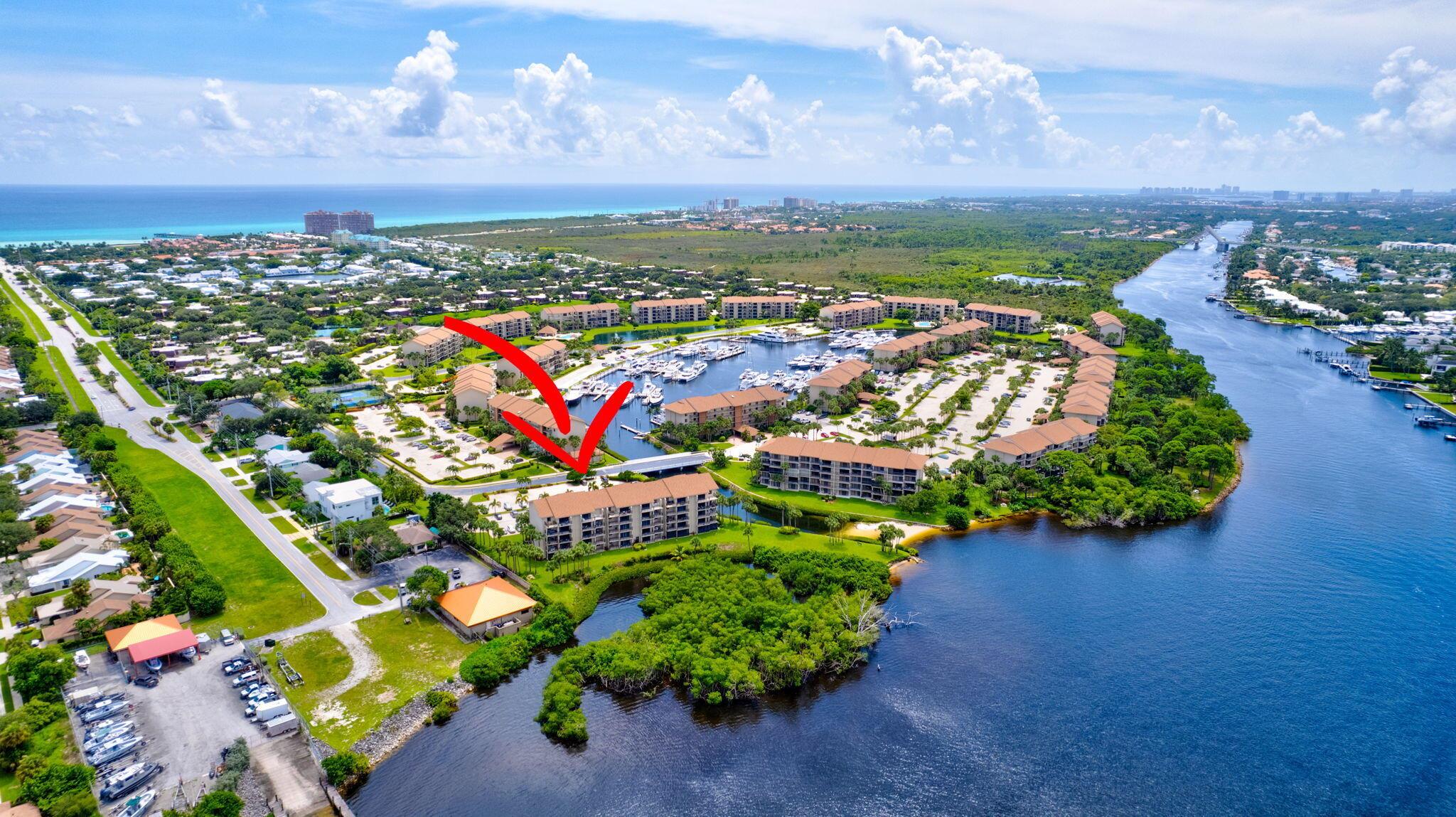 Step into this stunning, updated condo with breathtaking intracoastal views! The beautifully remodeled kitchen features modern white shaker cabinets, sleek quartz countertops, & stainless steel appliances - perfect for culinary adventures.  With 2017 impact-resistant sliding glass doors & windows & a hurricane-rated front door, you'll have peace of mind year-round. Enjoy the 2017 balcony with ample space for outdoor dining. The stylish wood-look tile floors enhance the open feel throughout the main living area. 2023 Roof!  2021 AC.  W/D in unit.  Community features tennis, pickleball & four sparkling community pools.  Conveniently located near gorgeous beaches, premier shopping, world-class dining, golf, scuba diving & sport fishing. Just 15 minutes from Palm Beach International Airport