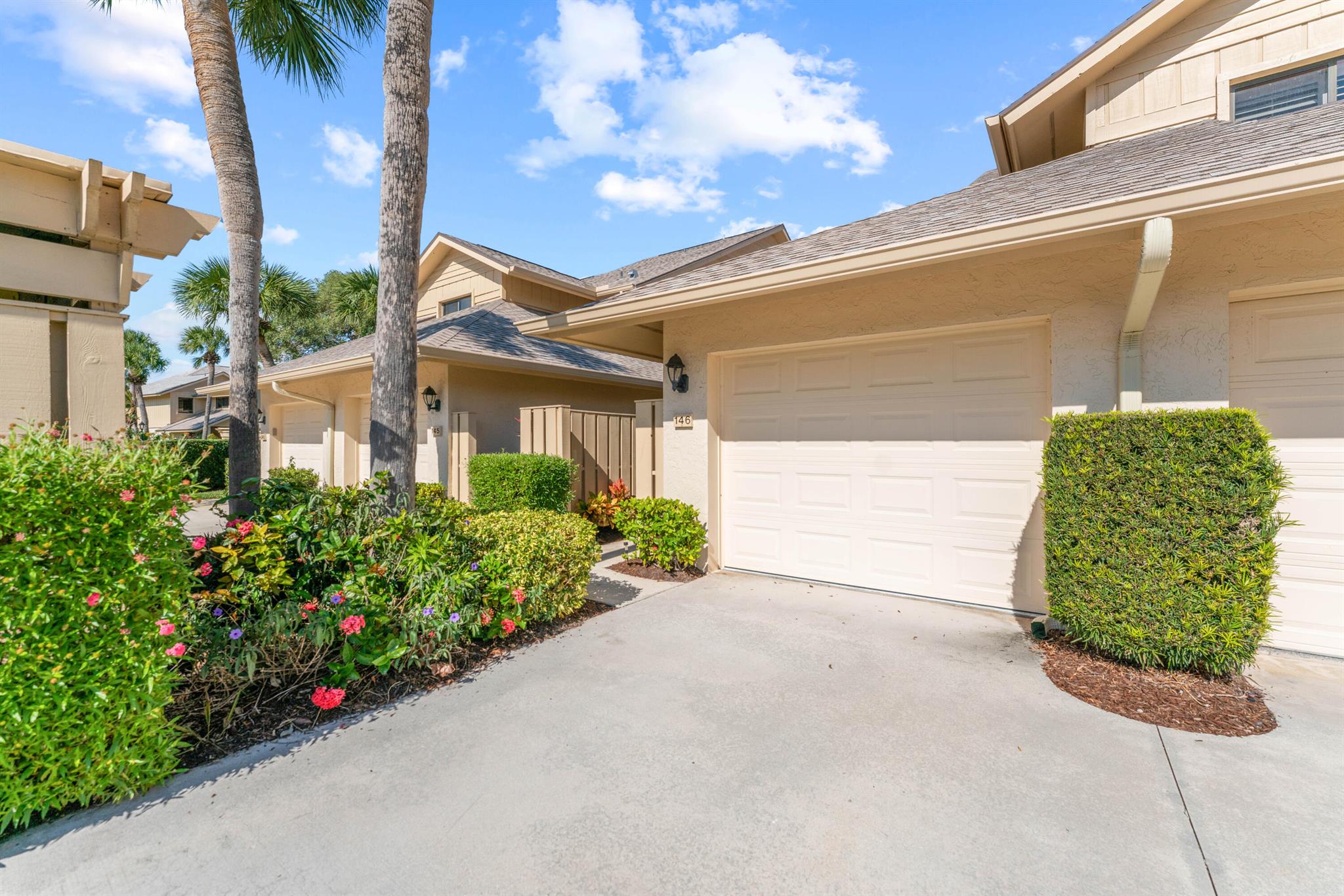 Welcome to the beautiful condominium community of Waterbend located within the gated community of Jonathan's Landing. Enjoy the beautiful golf course views from this well maintained first floor 2 bedroom, 2 bath unit. Features include a new roof (2020), new hot water heater (2021) and AC (2020), along with an impact garage door and impact windows in the breakfast nook. Jonathans Landing is located in the heart of Jupiter with great shopping, dining, only minutes to the beach and convenient to the airport. Club Membership is not required.