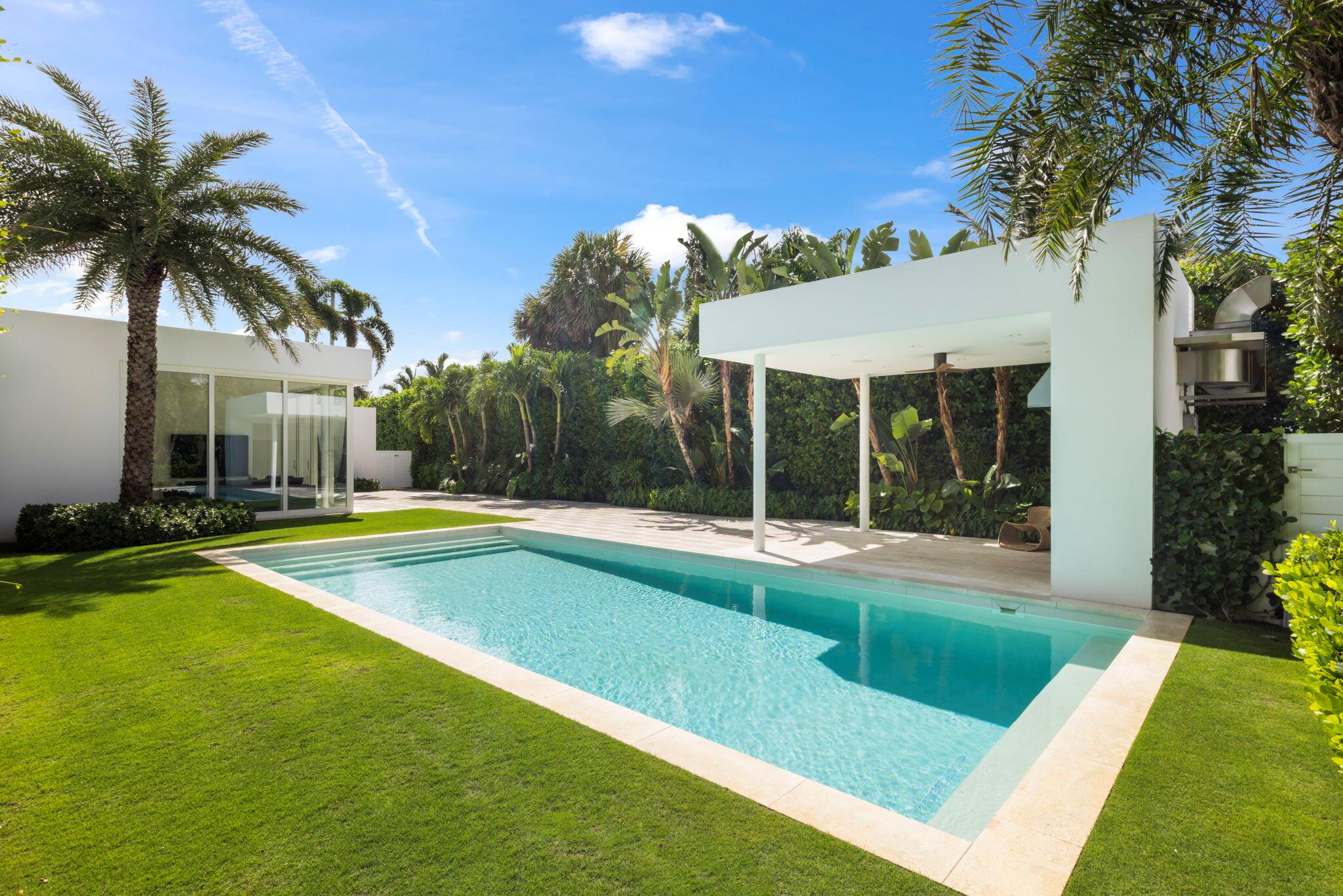 Welcome to Villa Blanca on the North End of Palm Beach Island. This modern marvel is a private oasis built to the highest quality. Starting with the custom front door designed by internationally acclaimed architect Isay Weinfeld, no detail has been overlooked in this custom built home. Boasting bespoke finishes including Peetz windows and doors from Germany and imported Italian travertine floors, the residence features level 5 finishes throughout and museum quality skylights also seen in The Whitney Museum in New York - which warmly welcome the immense natural light to flow into every room. A special oasis on an oversized lot, this contemporary masterpiece is positioned ideally just north of the Beach Club and Palm Beach Country Club, and includes private deeded access to the pristine beaches of the North End, just steps from your front door.