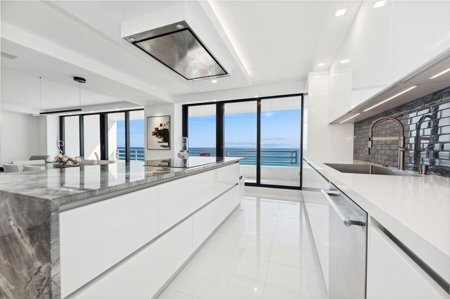 S-1503 is the height of oceanfront luxury. Newly renovated in 2022, this 2 bedroom, 2.5 bath residence features every upgrade imaginable; the contemporary kitchen features state of the art appliances including a steam oven, convection cooktop island w/ extra storage, seating & waterfall edge. The living area includes a custom wet bar w/ a stunning wine display, perfect for entertaining. All of the bathrooms have fabulous finishes such as a heated towel bar. The Creston system conveniently controls lights, audio, video & thermostat in the unit. Raised ceilings, open spaces, sparkling porcelain, designer hardware & impact glass are just some of the amenities in this residence. This 15th floor unit offers panoramic ocean vistas to the east & fabulous city views of Boca Raton to the west. The Addison On The Ocean is an exclusive oceanfront condominium on the sparkling shore of Boca Raton, Florida. This opulent condominium offers resort-style living for just 169 luxurious residences. Each residence features immense square footage and panoramic vistas of the turquoise Atlantic ocean. The Addison On The Ocean welcomes you with dramatic porte-cochere entries with stunning water features, designer landscaping and premier valet service.

Upon entering the lobby, you are greeted by stunning interior design elements and a backdrop of the glistening ocean. This concierge building features all the lavish amenities one would expect in a 5-star resort. Few condominiums offer dining, The Addison On The Ocean offers dining in the completely renovated restaurant as well as, Al Fresco options on the pool deck, gazebo or while lounging on the ocean. Residents may also gather and entertain in the fully renovated social room. The impeccable food service includes breakfast, lunch, take-out dinners and private event catering.

The Addison On The Ocean embodies the essence of first class living, including on-site management, 24-hour maintenance and in-house concierge. The stress-free lifestyle is enriched by conveniences that may be arranged by the concierge; including housekeeping, automobile care and transportation services.

The 24-hour security team utilizes state of the art communication, while the grounds are monitored with vast video surveillance coverage. BuildingLink technology enables residents, management and staff to interact in real time. The innovations continue with newly installed electric vehicle charging stations.

Health and self-care are of the utmost importance and The Addison On The Ocean embraces a healthy lifestyle with fully renovated wellness areas, including five fitness centers, saunas, steam rooms and massage services. There are an array of recreational facilities including a dog park, aquatic therapy, water aerobics, basketball, volleyball, kayaks, bicycles, paddle boards, ping-pong, billiards, arcade games, a library/business center and a gorgeous social hall. This one-of-a-kind property continues to impress with its luxurious outdoor spaces. These spaces include two completely renovated pools, all new decking, a fabulous al fresco liquor lounge, custom fire-pits and waterfall features.

The Addison On The Ocean is appointed with only the finest trimmings and ultra-luxury amenities, it is Boca Raton's most exclusive oceanfront address.

Information published or otherwise provided by the listing company and its representatives including but not limited to prices, measurements, square footages, lot sizes, calculations, statistics, and videos are deemed reliable but are not guaranteed and are subject to errors, omissions or changes without notice. All such information should be independently verified by any prospective purchaser or seller. Parties should perform their own due diligence to verify such information prior to a sale or listing. Listing company expressly disclaims any warranty or representation regarding such information.